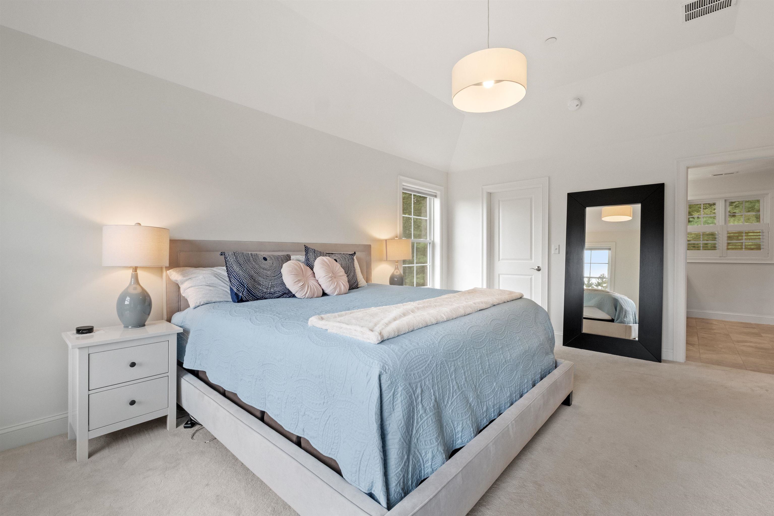 Spacious Primary Bedroom with Beautiful Tray Ceiling