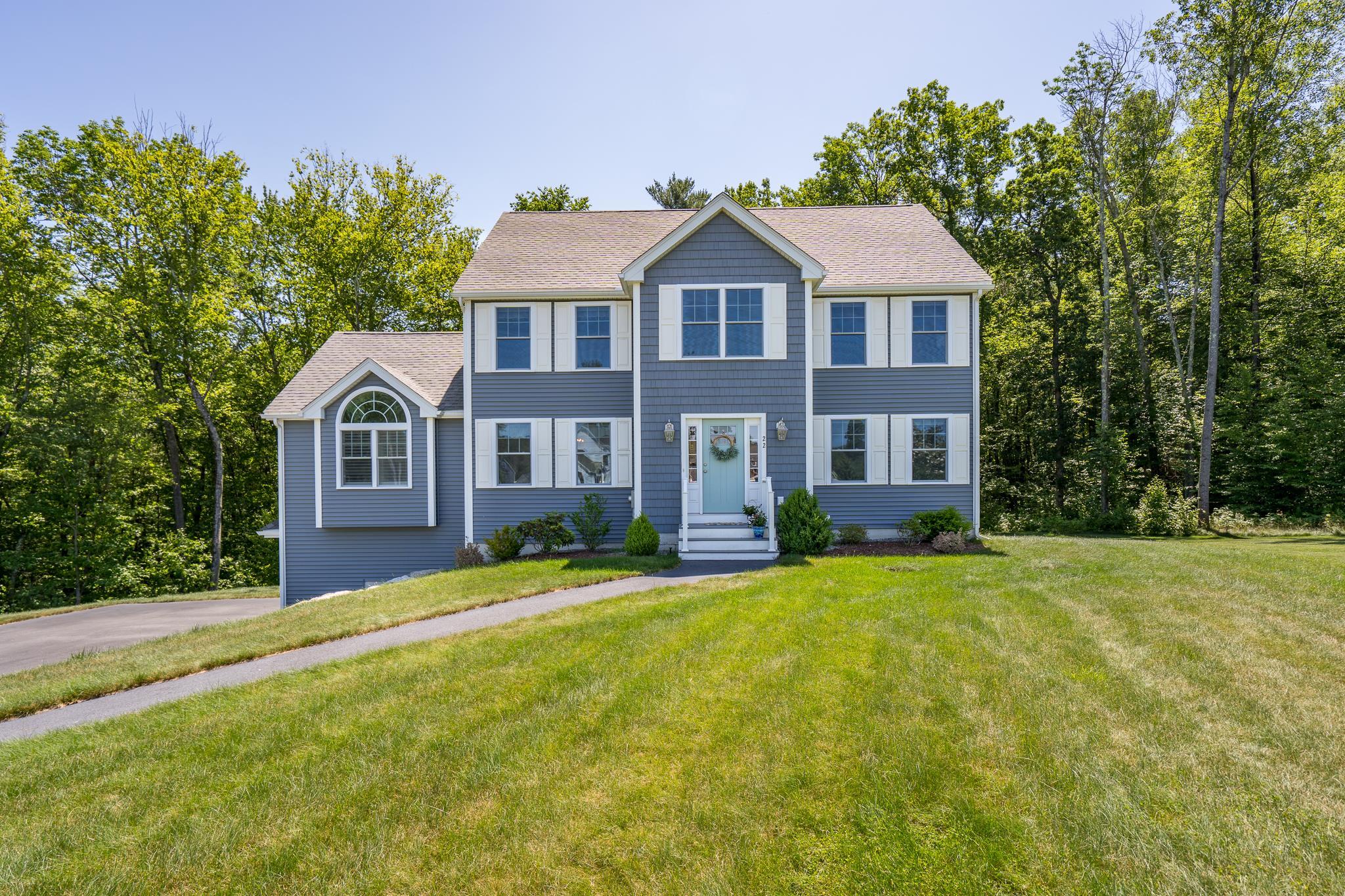Welcome Home to this stunning 4-bedroom, 4-bathroom Colonial nestled in a beautiful cul-de-sac neighborhood in the desirable town of Pelham, NH. Built just 6 years ago with numerous builder upgrades, this home offers the perfect blend of modern style and timeless comfort. From the moment you enter, you'll appreciate the attention to detail—upgraded lighting, stylish bathrooms, a chef-inspired kitchen, and rich flooring throughout. The walkout basement was recently finished to include a half bath.  Need more space?  The large attic is ready for your finishing touches. The spacious layout is ideal for both everyday living and entertaining. Step outside to enjoy the professionally landscaped yard, complete with a Reeds Ferry shed and a large swing and playset—perfect for outdoor fun. Nature lovers will love the close proximity to scenic walking trails and the ability to walk to Pelham Town Beach and Long Island Pond. Located just minutes from highways, shopping, and hospitals, this home offers the peace of a quiet neighborhood with the convenience of nearby amenities. Don't miss your opportunity to make this beautifully maintained home yours!