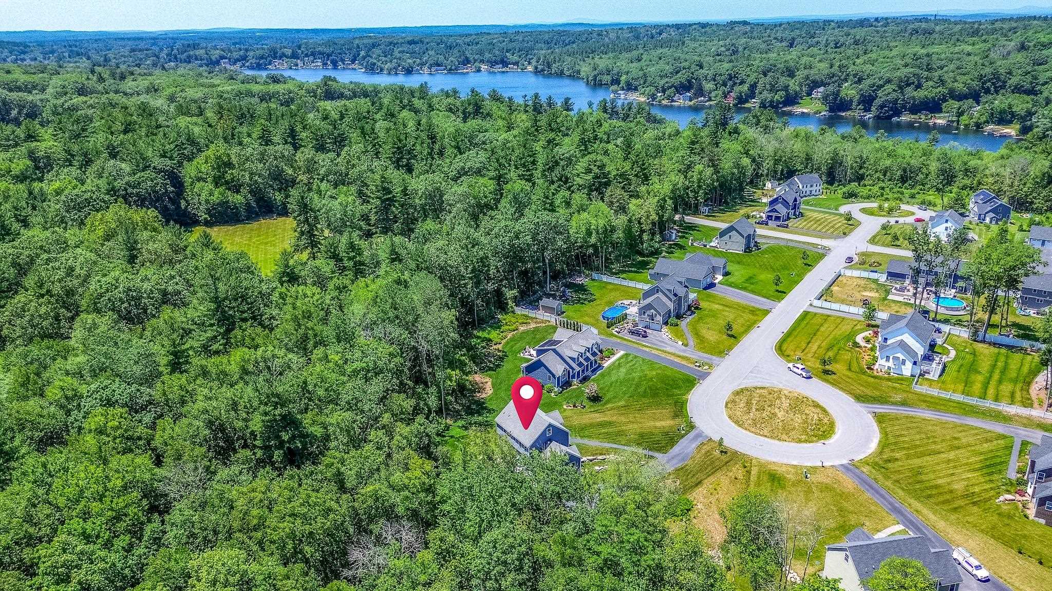 Welcome Home to this stunning 4-bedroom, 4-bathroom Colonial nestled in a beautiful cul-de-sac neighborhood in the desirable town of Pelham, NH. Built just 6 years ago with numerous builder upgrades, this home offers the perfect blend of modern style and timeless comfort. From the moment you enter, you'll appreciate the attention to detail—upgraded lighting, stylish bathrooms, a chef-inspired kitchen, and rich flooring throughout. The walkout basement was recently finished to include a half bath.  Need more space?  The large attic is ready for your finishing touches. The spacious layout is ideal for both everyday living and entertaining. Step outside to enjoy the professionally landscaped yard, complete with a Reeds Ferry shed and a large swing and playset—perfect for outdoor fun. Nature lovers will love the close proximity to scenic walking trails and the ability to walk to Pelham Town Beach and Long Island Pond. Located just minutes from highways, shopping, and hospitals, this home offers the peace of a quiet neighborhood with the convenience of nearby amenities. Don't miss your opportunity to make this beautifully maintained home yours!