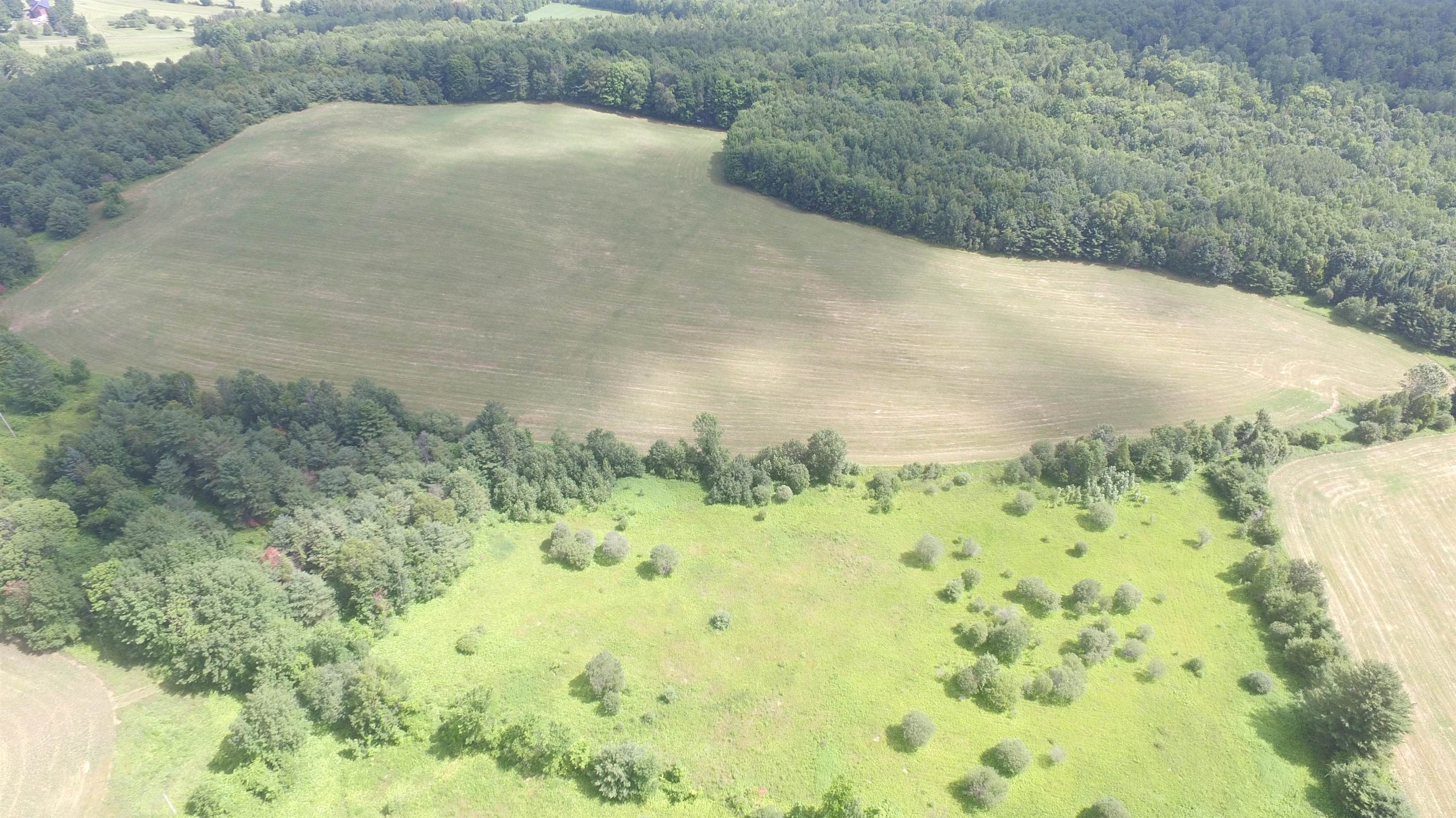 View of 71 AC back land