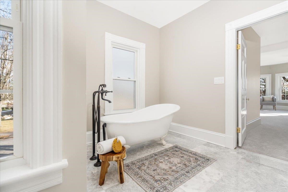 Primary Bathroom w/ clawfoot soaking tub