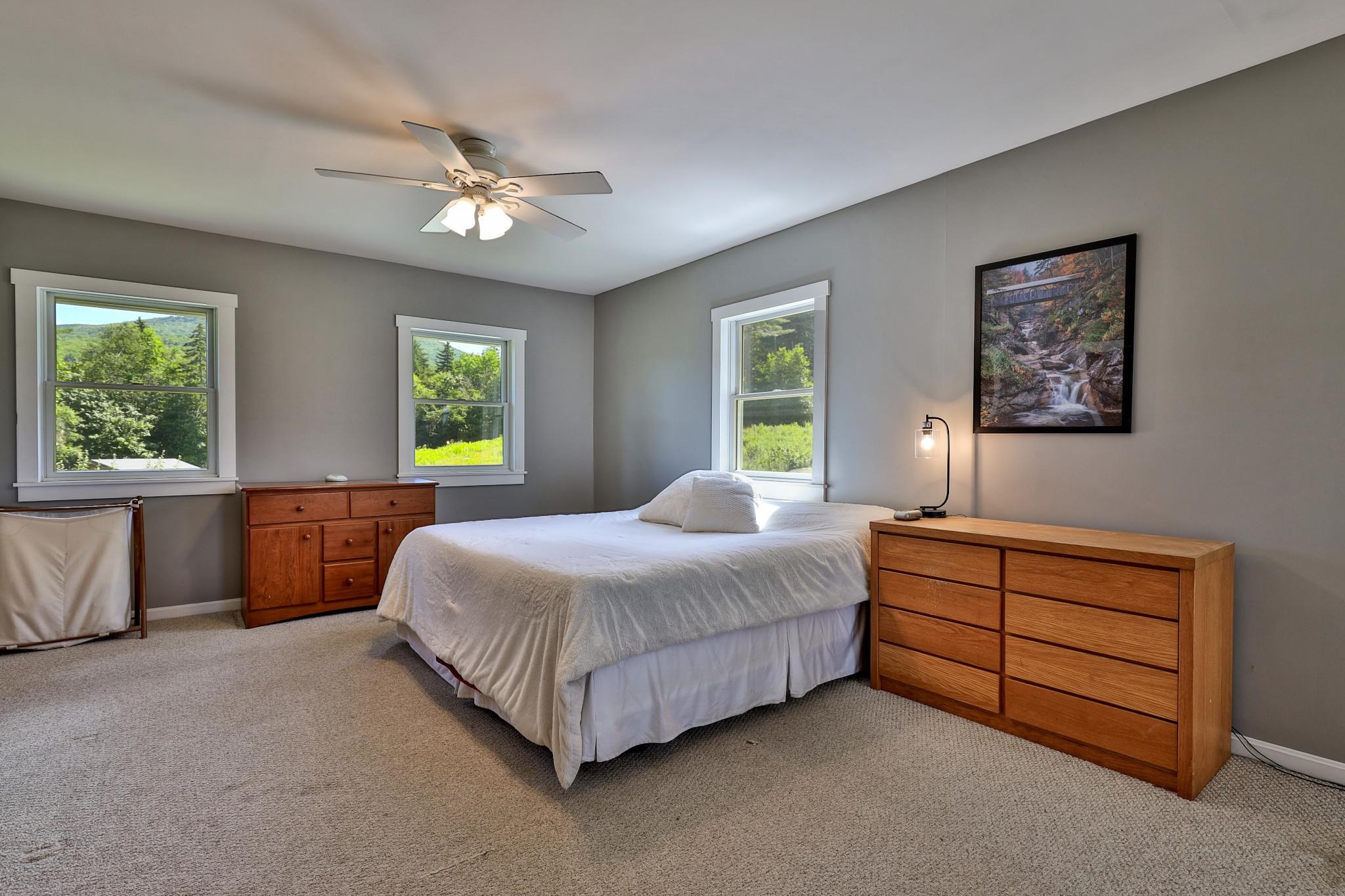 Primary bedroom with mountain views