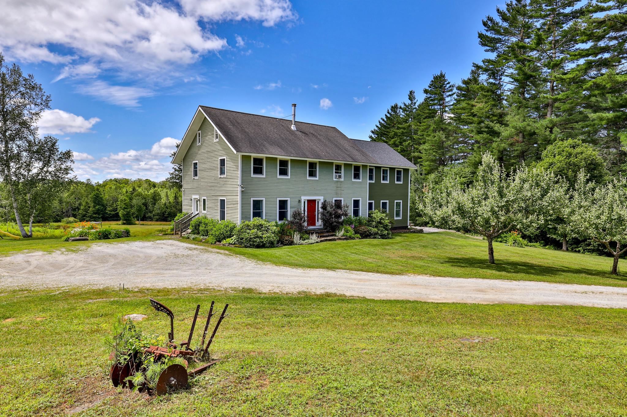 Front lawn landscaping and fruit trees