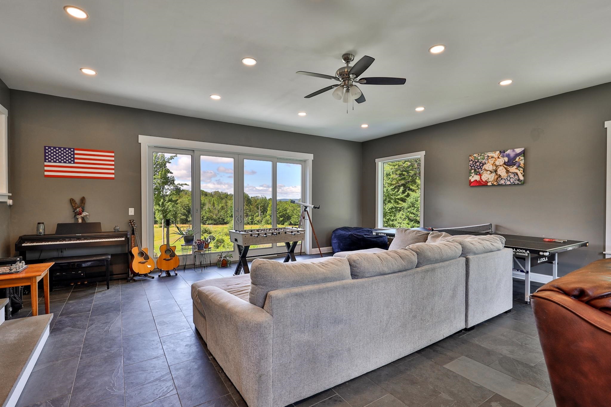 Bonus room with high ceilings and radiant flooring