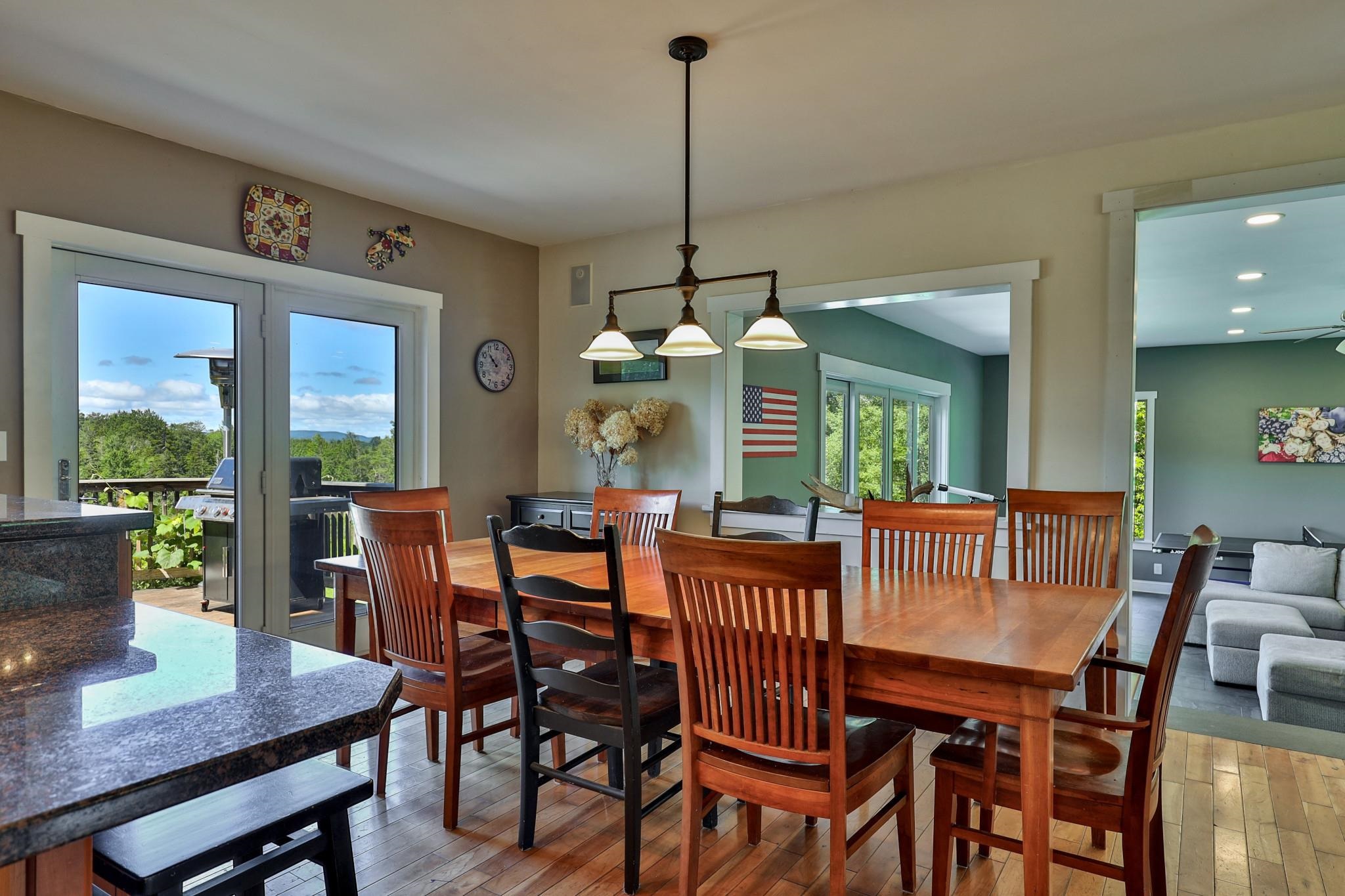 Dining area opening to deck