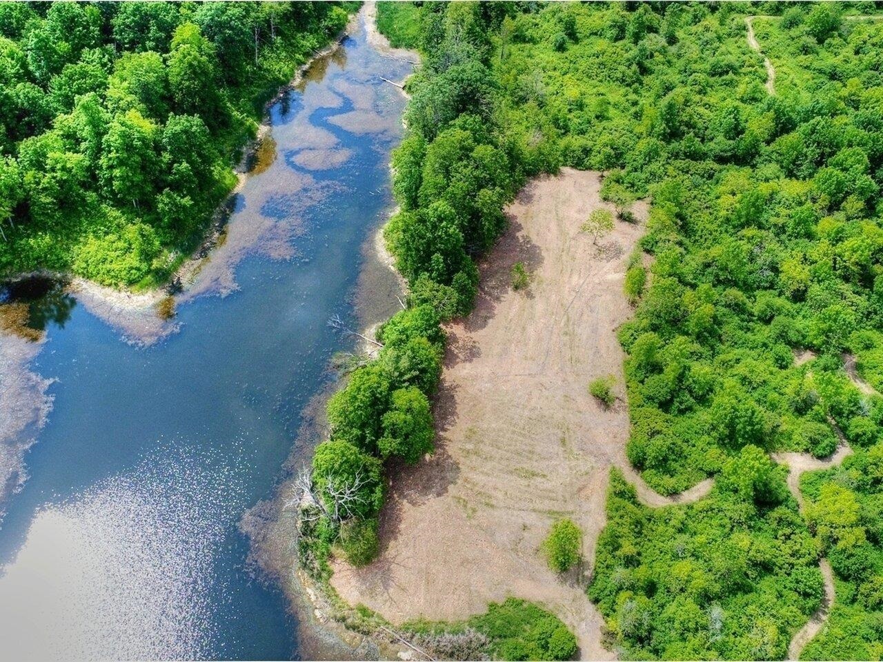 Building site adjacent to pond