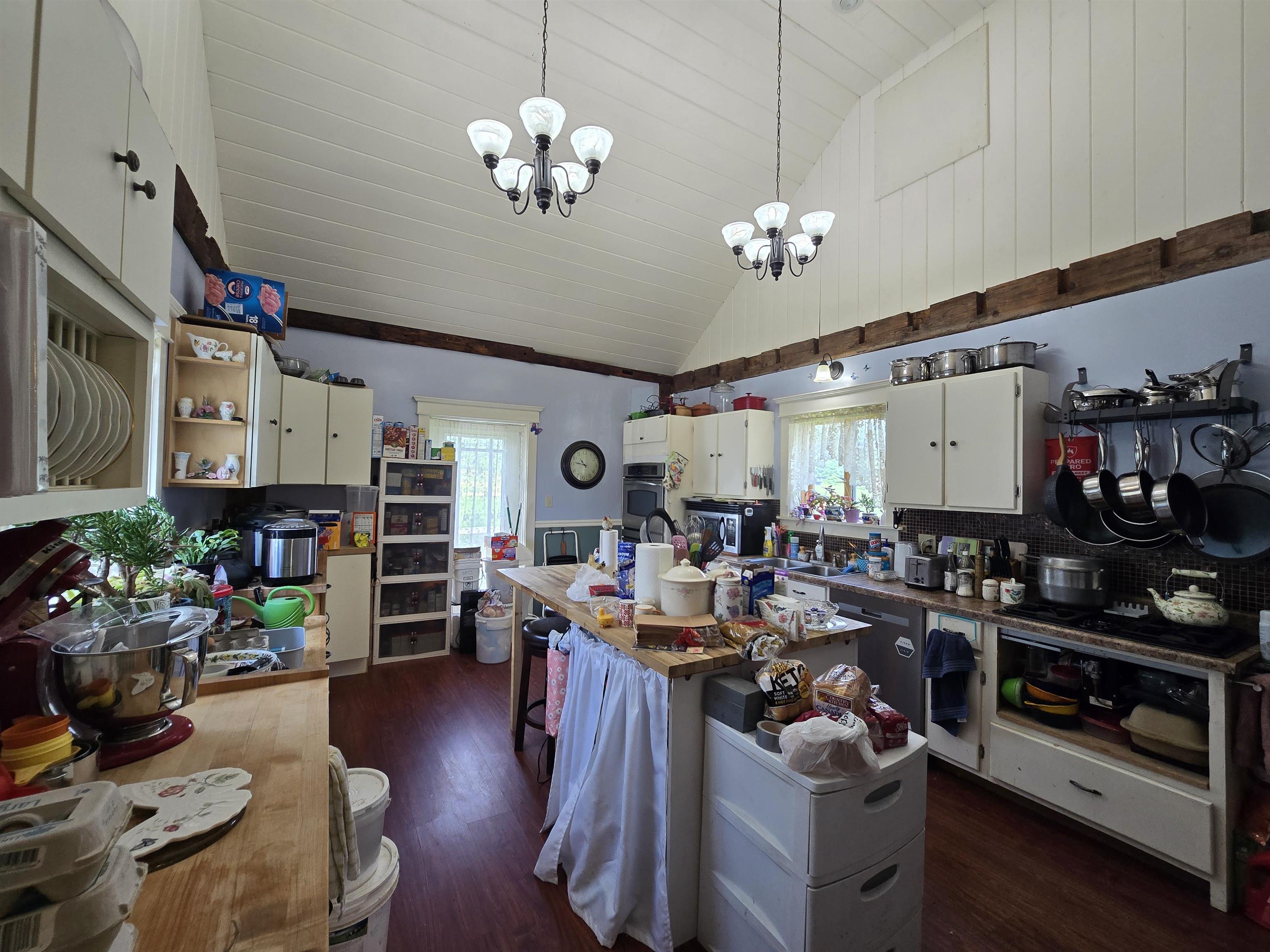 vaulted ceiling with exposed beams
