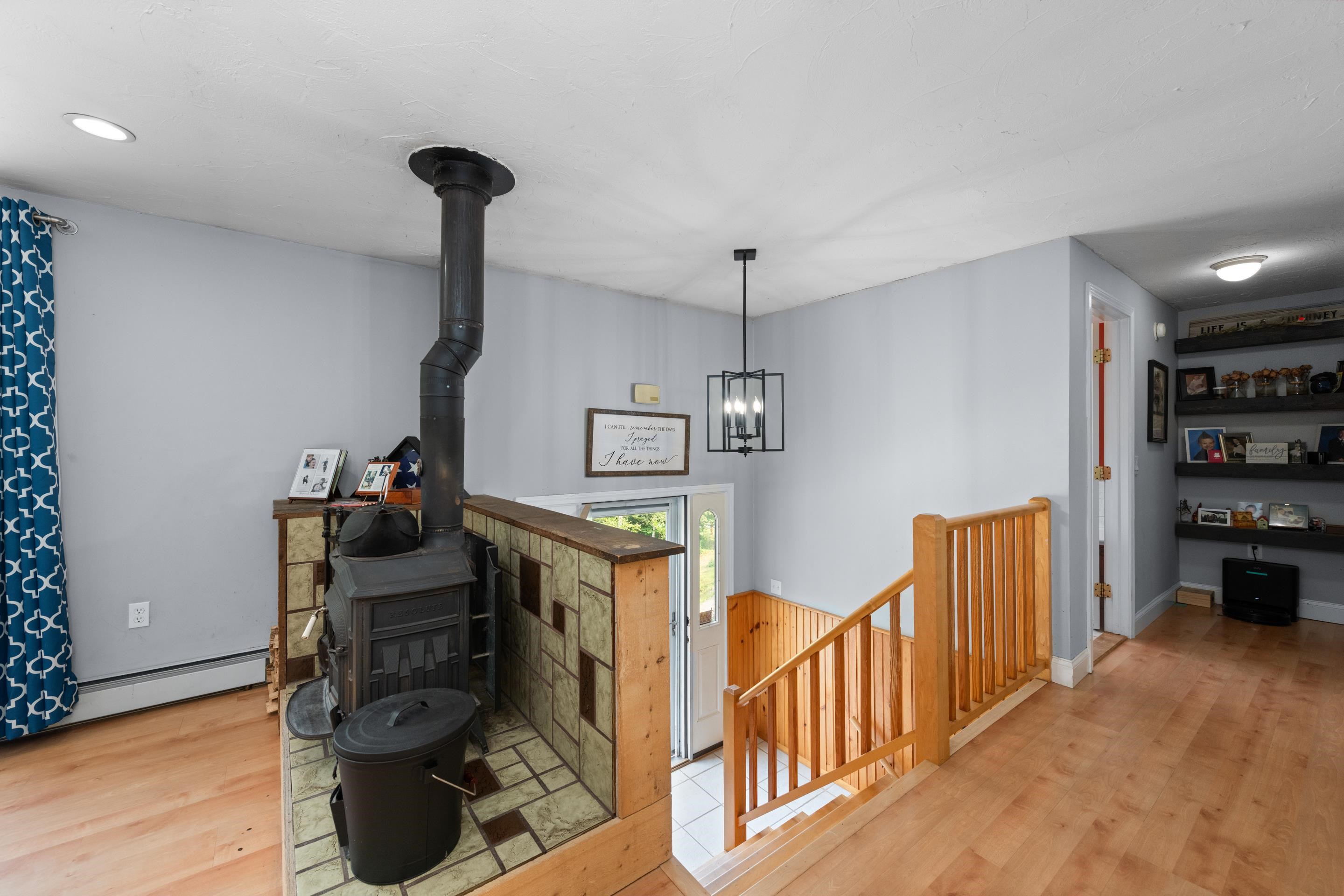 The wood stove is the focal point of the living space