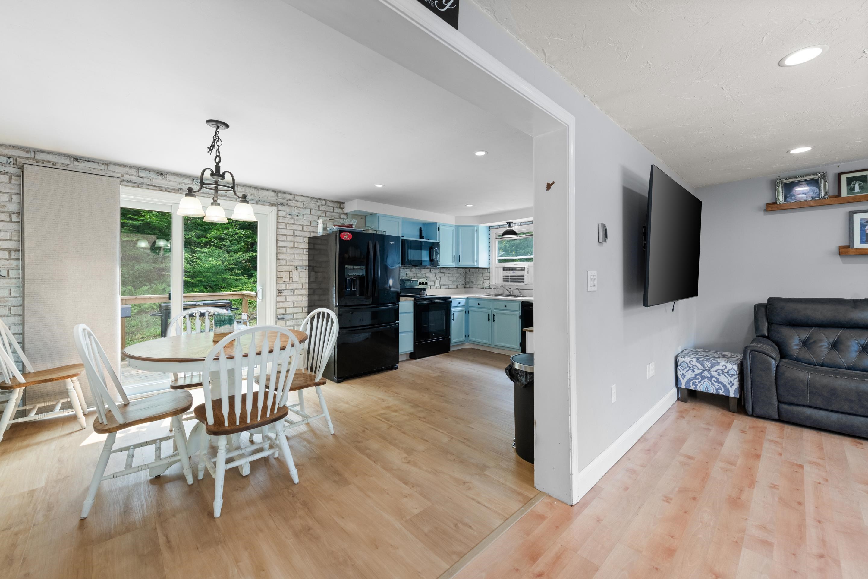 Right off the living room is the dining/kitchen