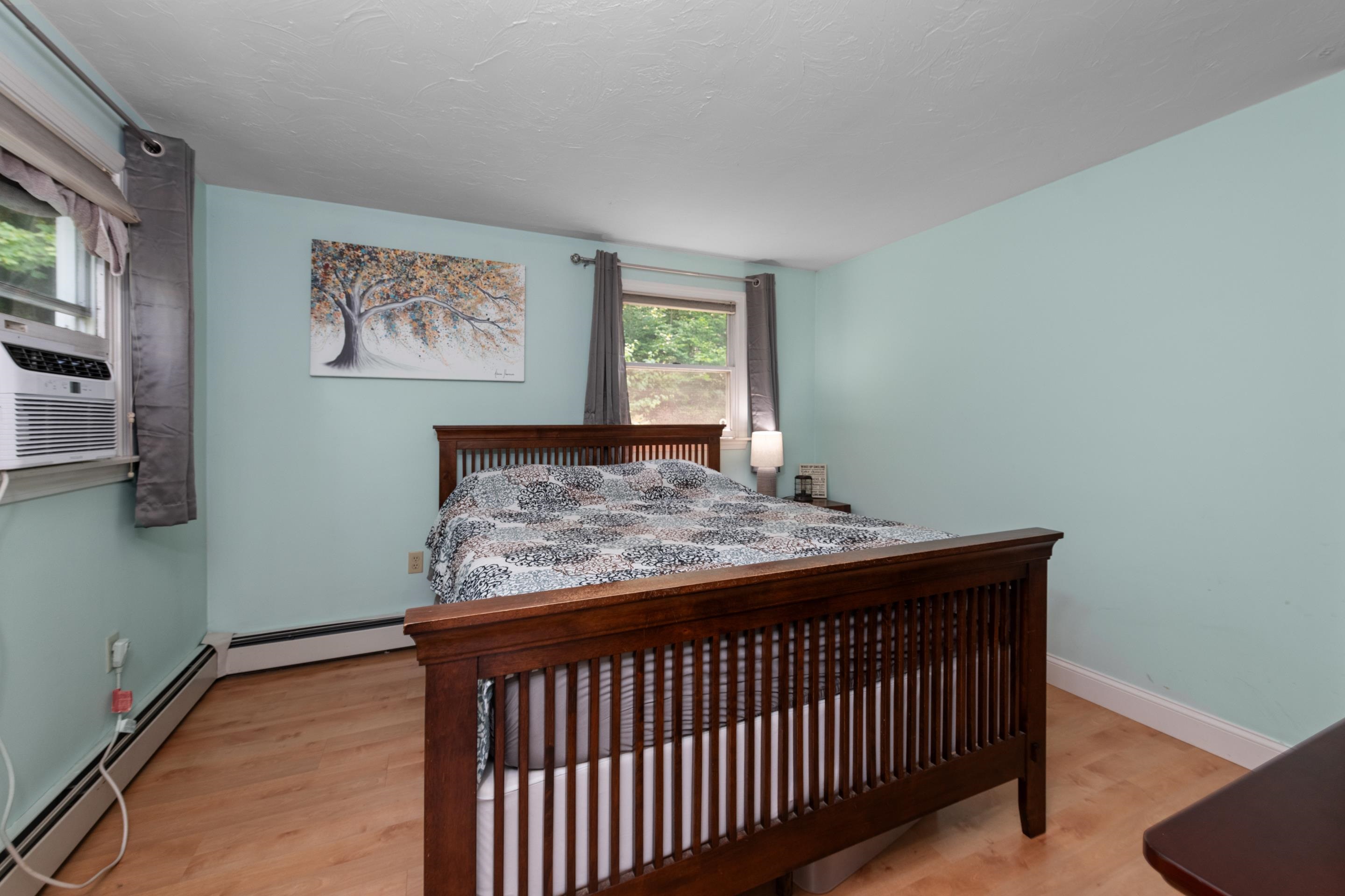 The primary bedroom has a walk in closet and private 1/2 bathroom