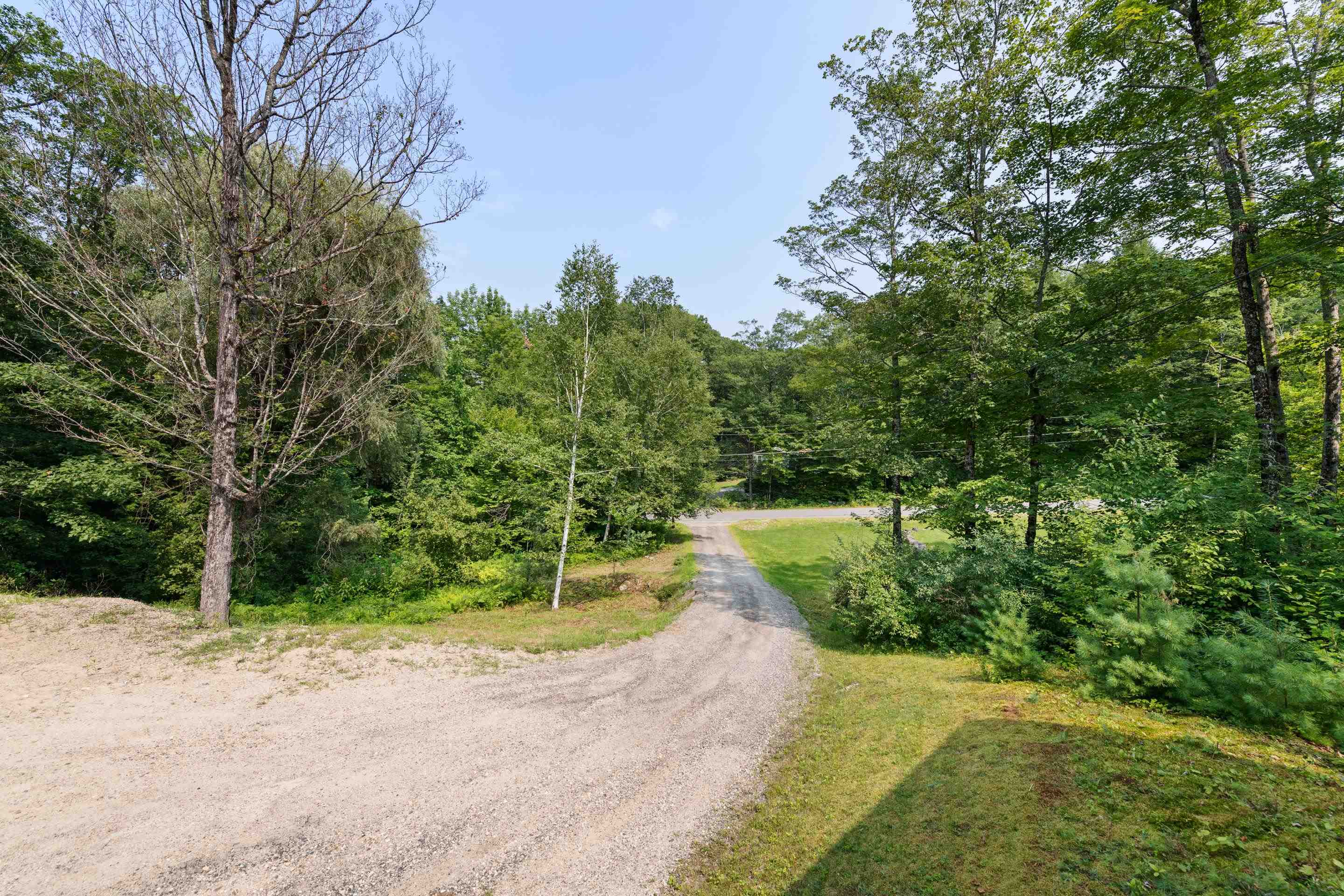This home is privately set back from the road