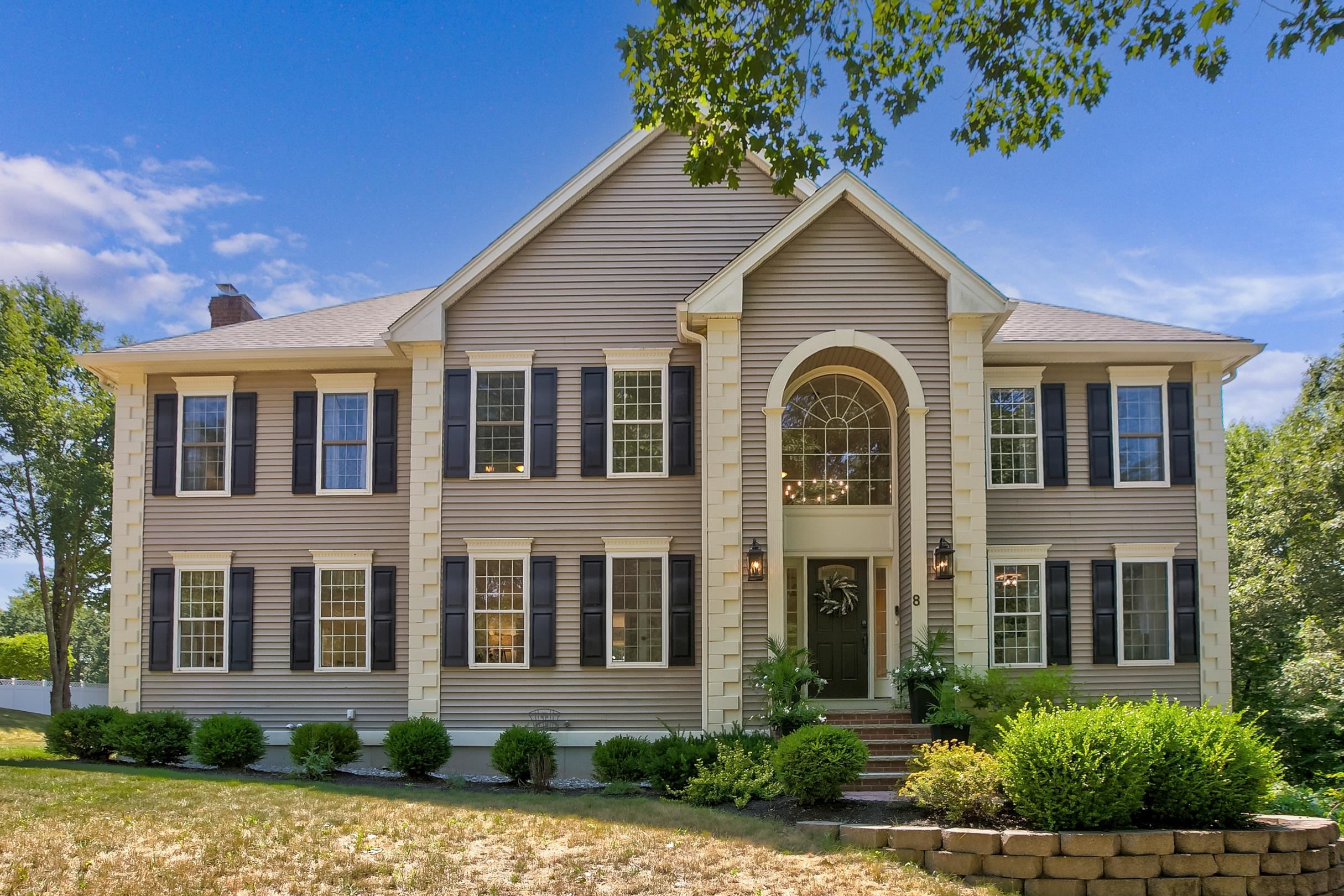 Stunning Colonial in One of Windham’s Most Sought-After Neighborhoods! Located minutes to schools, Griffin Park, and I-93—this home is truly a rare find! Live the resort lifestyle on your private 2.7 acre lot with an in-ground salt water pool, cabana, and multi-use sport court to play tennis, pickleball, and basketball. Relax and unwind from your patio and enjoy watching the games. Step inside this custom colonial that features 4-beds, 4-baths to discover a thoughtfully designed layout with a magnificent 2-story foyer flanked by an office and formal living space. Open concept living with an updated gourmet kitchen with quartz countertops and stainless steel appliances with an eat-in dining area that leads into an oversized family room with a cozy wood burning fireplace. Double sliders on the 1st floor give you access to your new composite deck overlooking your private sanctuary. A laundry room and ½ bath finishes off the 1st floor. Head upstairs to the luxurious, oversized primary suite that features vaulted ceilings and 2 walk-in closets.The primary spa-like bath with double sinks, jacuzzi, and walk-in shower. Three additional bedrooms and a full bath with double sinks finish off the 2nd floor. Head downstairs to the partially finished basement that features an oversized room to suit your needs with a ½ bath. Additional highlights include walk-up attic, central AC, central vac, and oversized 2-car garage. Come visit the Open House 8/9 & 8/10 from 11AM-1PM.