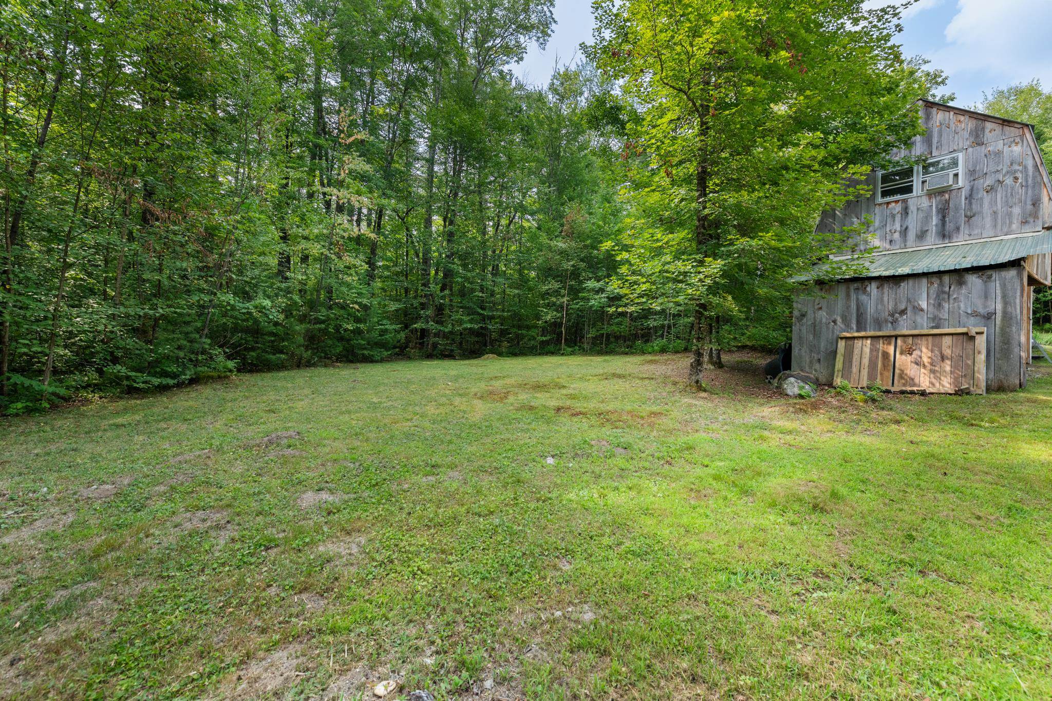 Yard to left of barn