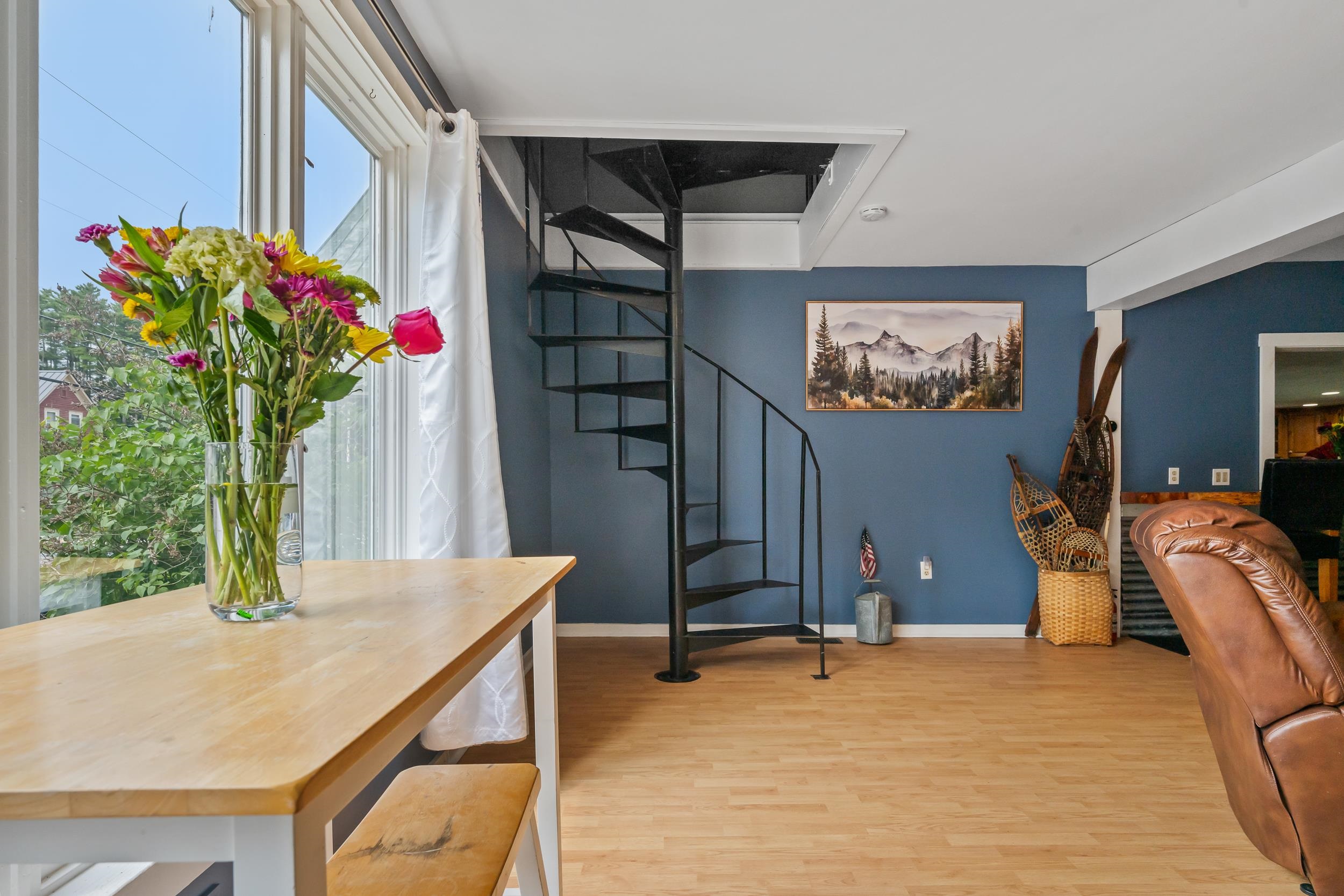 Spiral staircase to enter Primary Bedroom