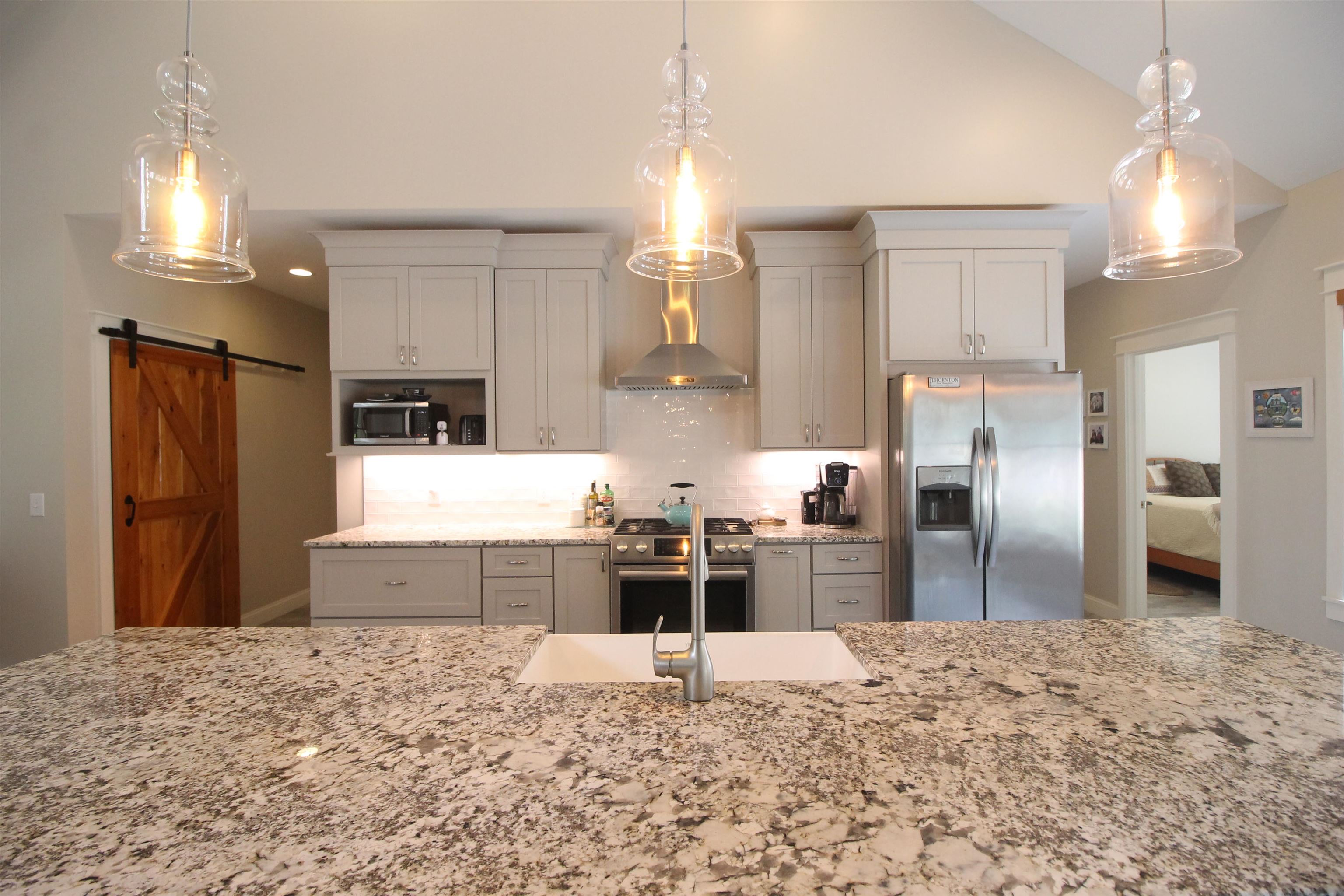 Granite counter-tops and beautiful fixtures