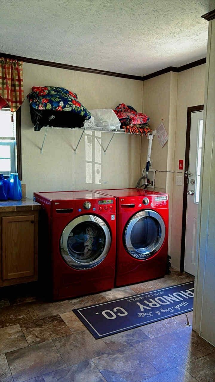 Other side of laundry room. 23872641