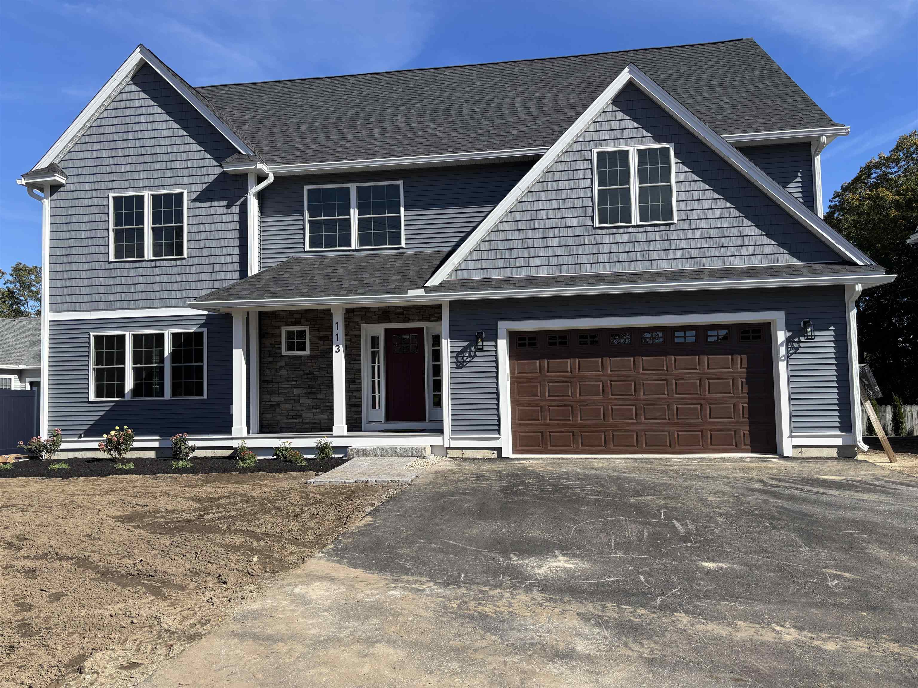 This exceptional new home, where modern elegance meets everyday comfort, features shaker-style maple cabinets, quartz countertops, a beverage center, sleek black fixtures, a large walk-in pantry, and an appliance allowance so buyers can choose their preferred brands and styles. Solid wood two-panel shaker doors with black hardware complement custom-finish carpentry, including 7¼" baseboards, wainscoting panels, and interior shelving. The flexible first floor is ideal for a home office, guest room, or private retreat, while upstairs offers three spacious bedrooms, a laundry room, and a 23' x 15' bonus room perfect for a media room, gym, or playroom. The primary suite includes a large walk-in closet and spa-inspired ensuite bath. Comfort and efficiency are ensured with a Bosch two-zone forced hot air system (95% efficiency), OnDemand hot water, and a 16+ SEER A/C condenser with insulated ductwork, plus 5½" open-cell foam insulation in the front living wall. Additional features include 30-year architectural shingles, vinyl low-E windows with argon, tilt-in sashes, double locks, and 16-foot-wide garage doors with LiftMaster openers. Every corner showcases architectural detail and timeless style, with upgrades and options still available. Located just moments from Greeley Park, enjoy walking trails, picnics, concerts, and year-round outdoor activities. Seller is a licensed real estate broker. Building plans may not reflect changes or measurements made during construction.