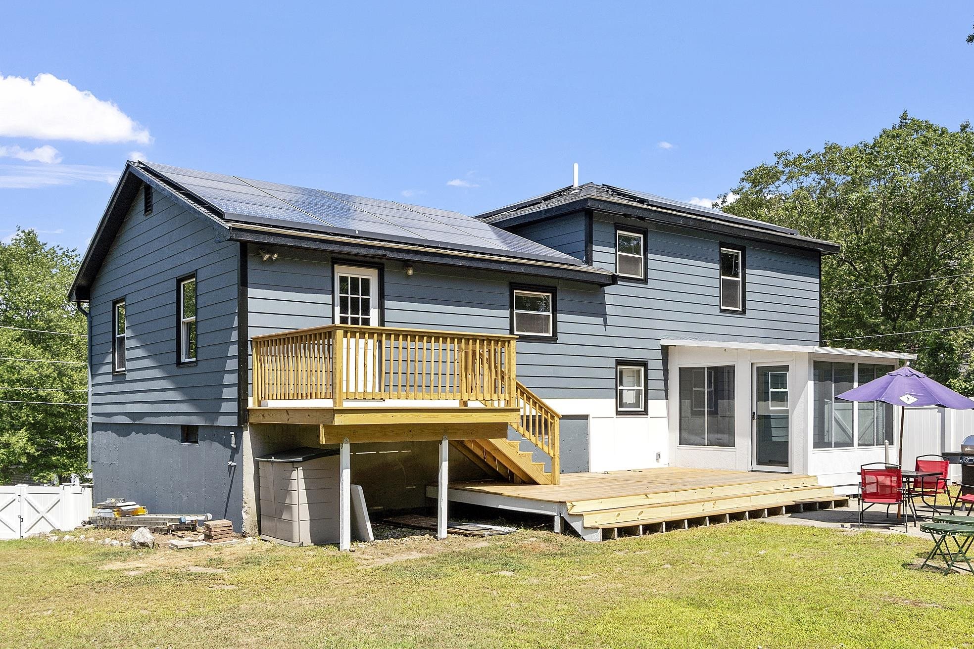 Back of the house and view of Solar Panels 23870711