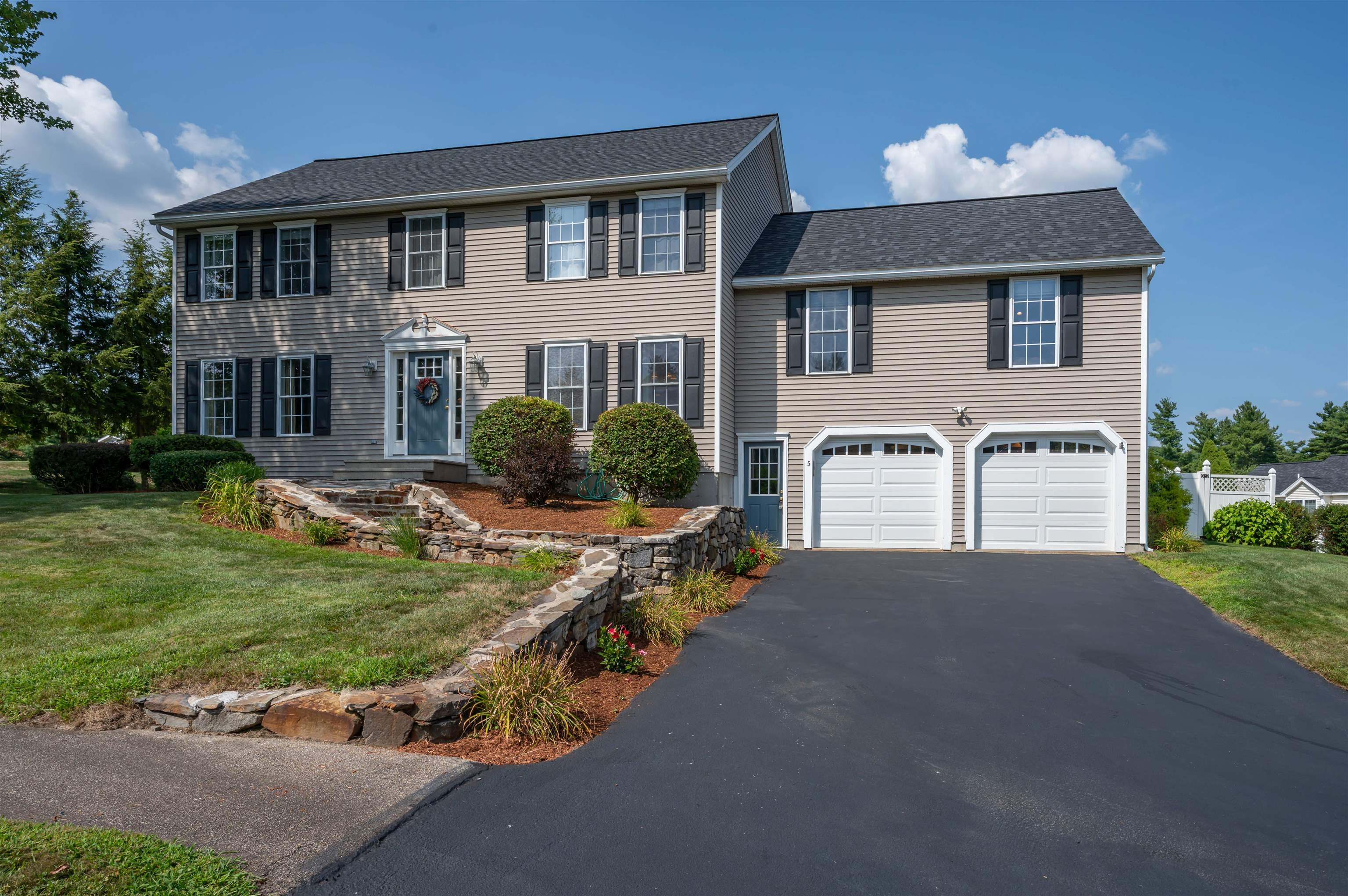 Get ready to fall in love with this stunning 4 BR, 2.5 bath home that truly has it all! The main level features a spacious living room, inviting family room with a gas fireplace, a formal dining room, a spacious kitchen, and a dedicated home office, perfect for today’s lifestyle. The kitchen is a standout with granite countertops, a stylish tile backsplash, stainless steel appliances, and under-cabinet lighting. Hardwood floors run through most of the home, adding warmth and charm. Upstairs, the primary suite offers a relaxing retreat with a private bath, while the finished basement provides even more space to unwind, entertain, or work. Step outside to your very own backyard oasis, featuring an in-ground pool (new pool pump 2025), stamped concrete patio, fire pit, composite deck, and a 4–6 person hot tub with new pump (2022), new cover (2025). The landscaped yard includes an irrigation system for easy maintenance. Major updates include a new roof (2023), HVAC system (2021), hot water heater (2020), pool filter (2022), garage doors (2021), and front door (2022). This move in ready home blends comfort, style, and resort style outdoor living. Don’t miss your chance to make it yours!