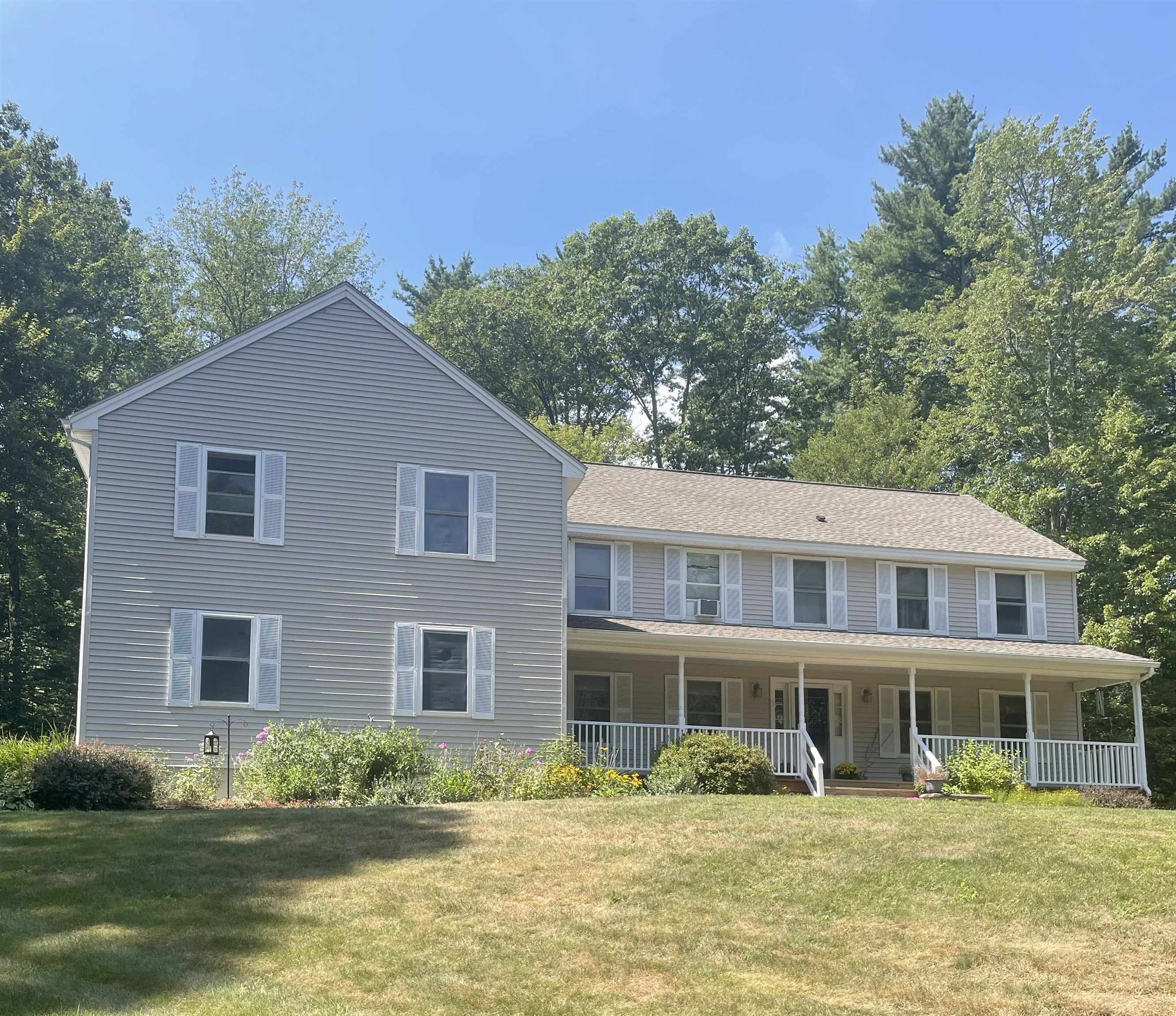 First time on the market! This privately situated Colonial is on a quiet cul-de-sac. The main home features four bedrooms, three bathrooms, a farmer's porch, a deck, a large kitchen with an oversized island, there is a plethora of closet space, a large pantry, a partially finished basement with a walkout slider. It has an in-law apartment that has its own garage and a separate entrance. The in-law also has a large deck attached to the eat in kitchen. This home is a must see! Open house Saturday, August 23rd from 10:00 a.m. to 12:00 p.m.
