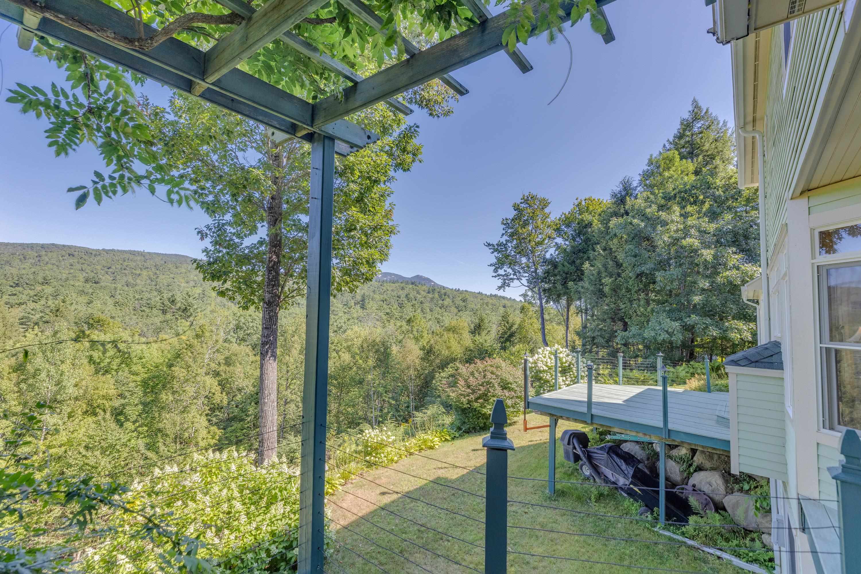Ivy covered primary suite deck