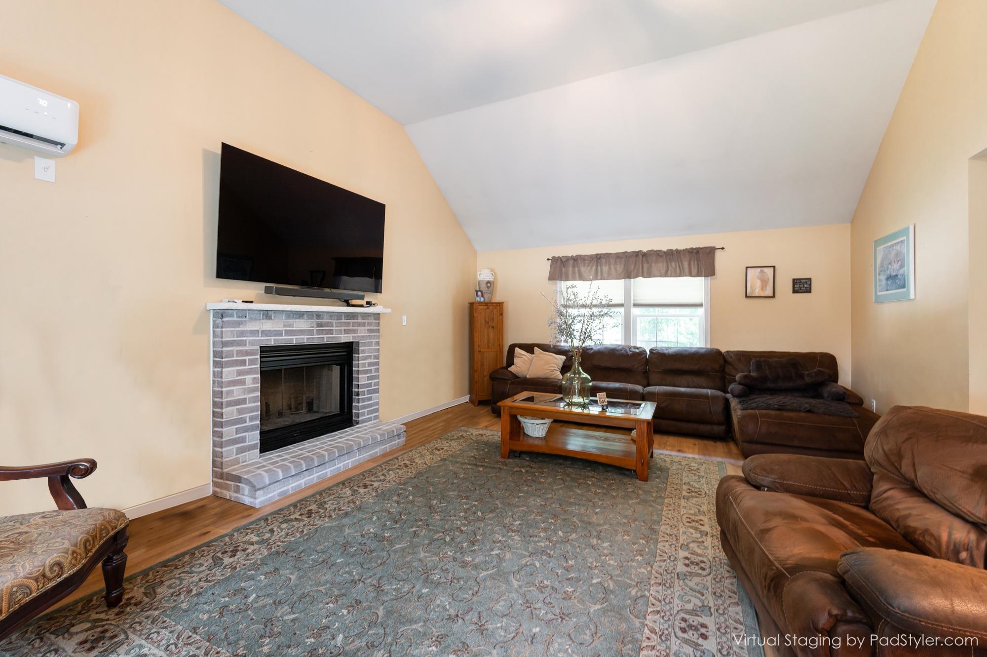 Family Room w/Fireplace & Cathedral Ceiling