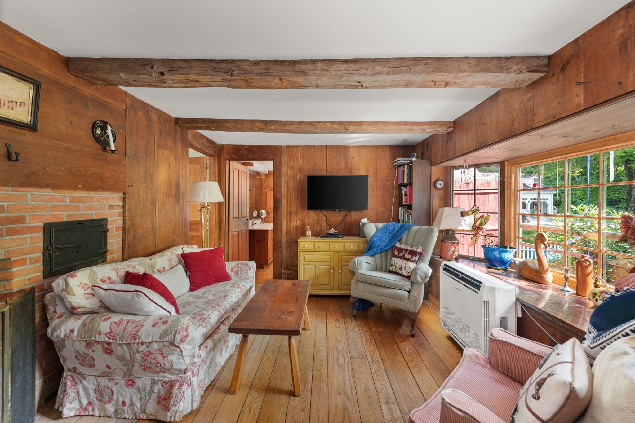 This cozy living room even has a mini split for heating and cooling