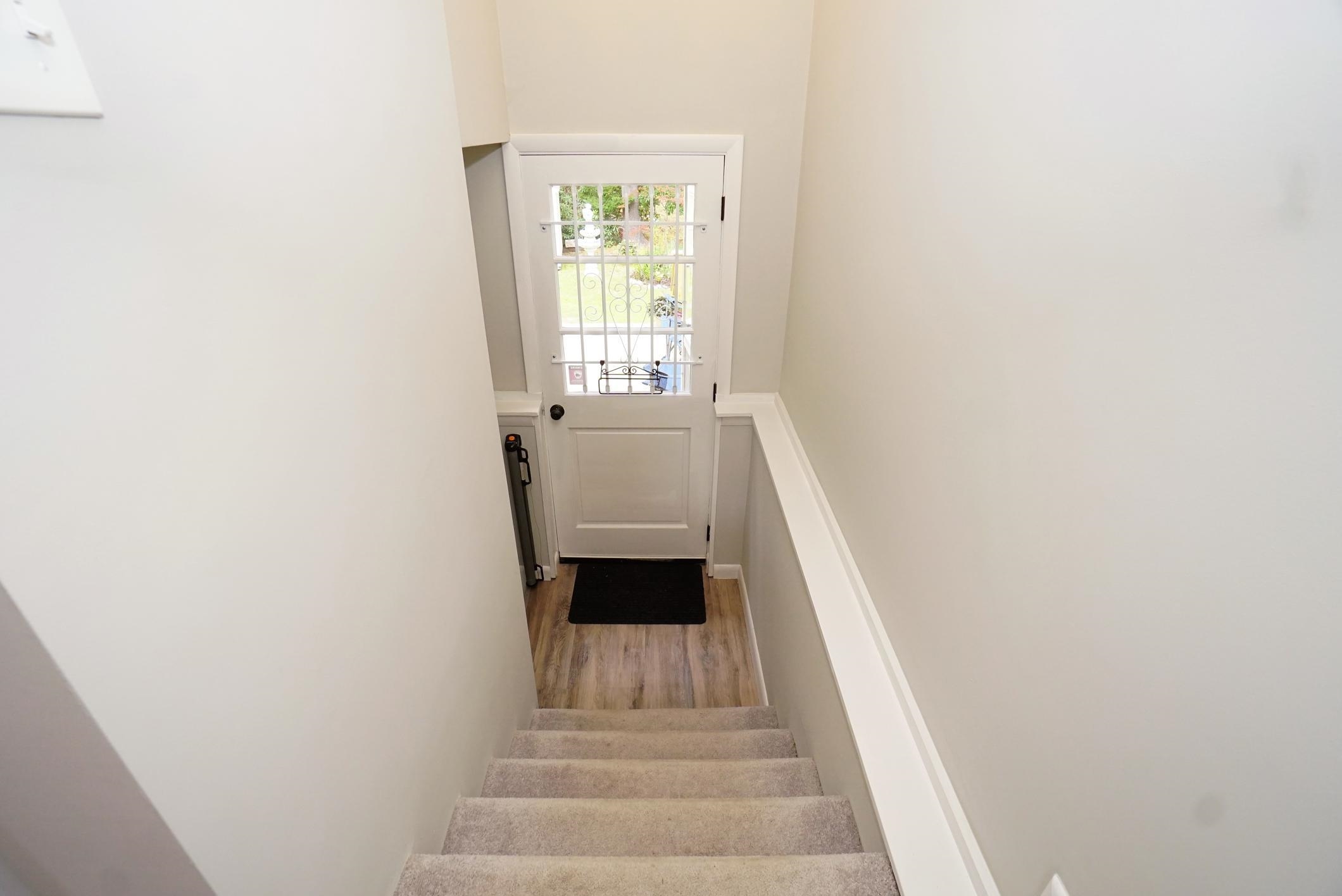 to the backyard /and lower level 23962204