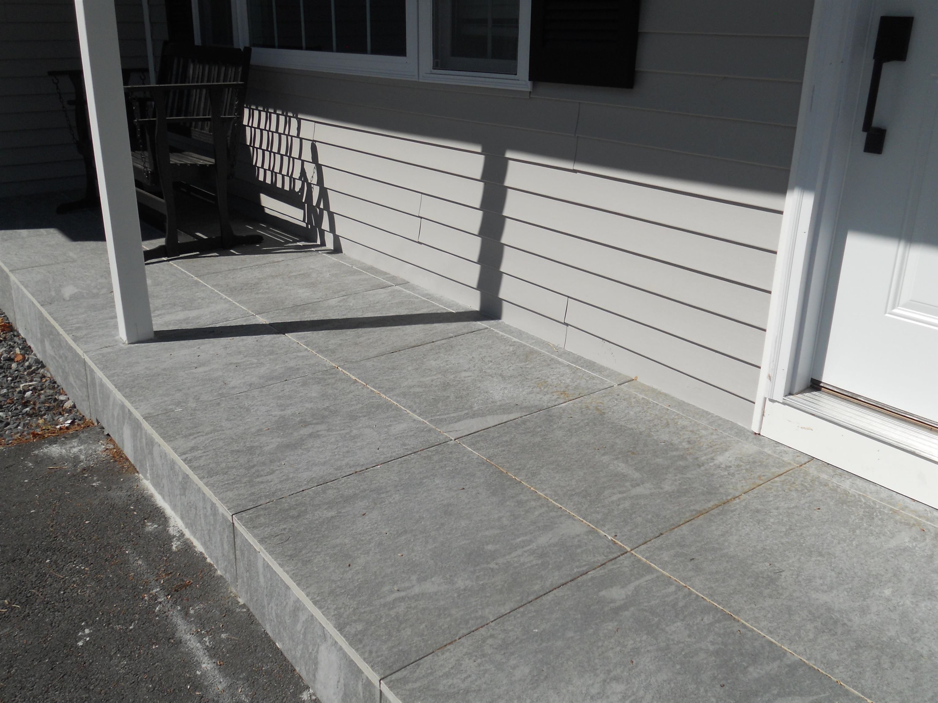 Beautiful New Tile on Covered Entry Porch Floor