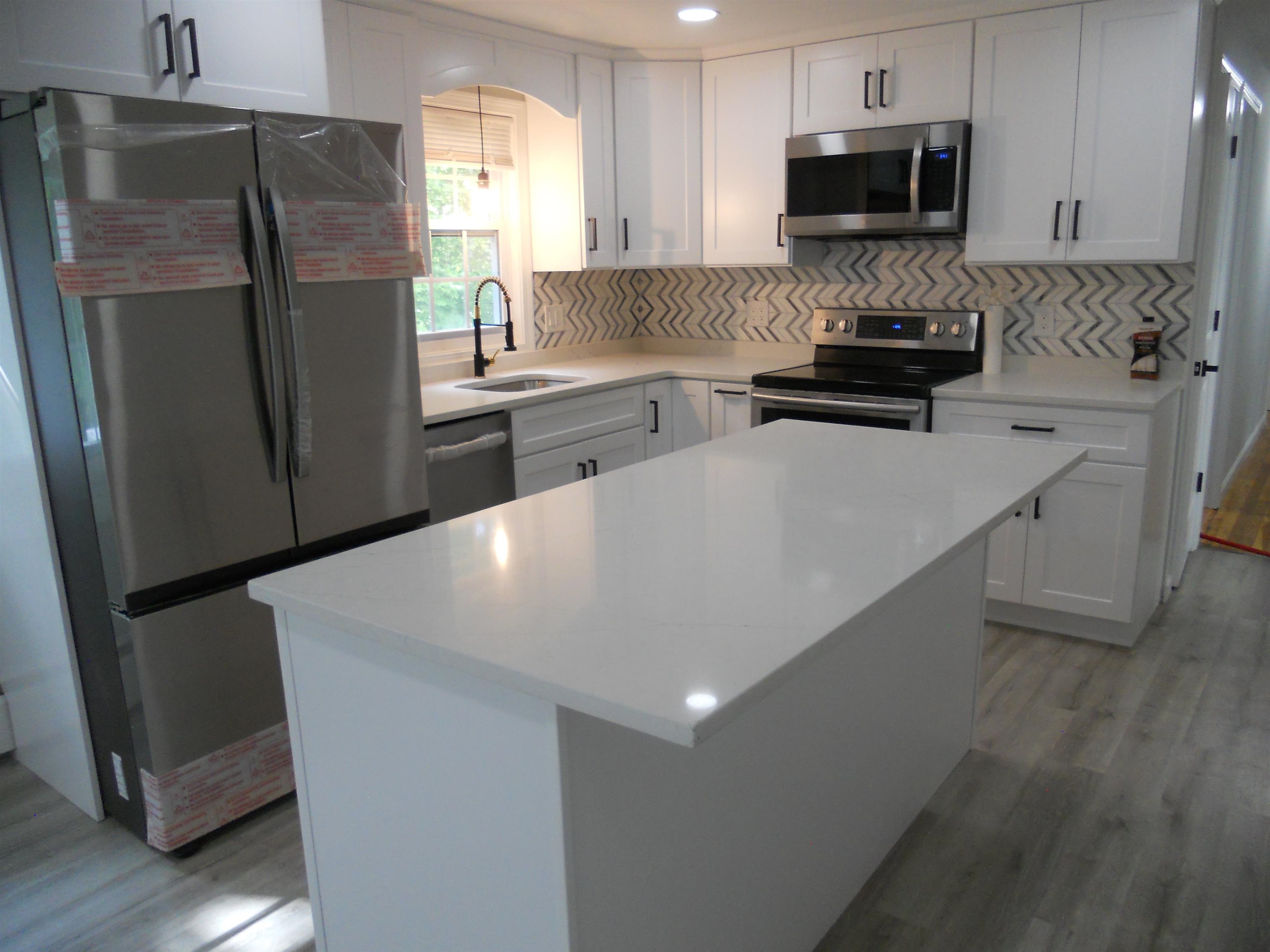 Quartz Counters and Soft Close Cabinets