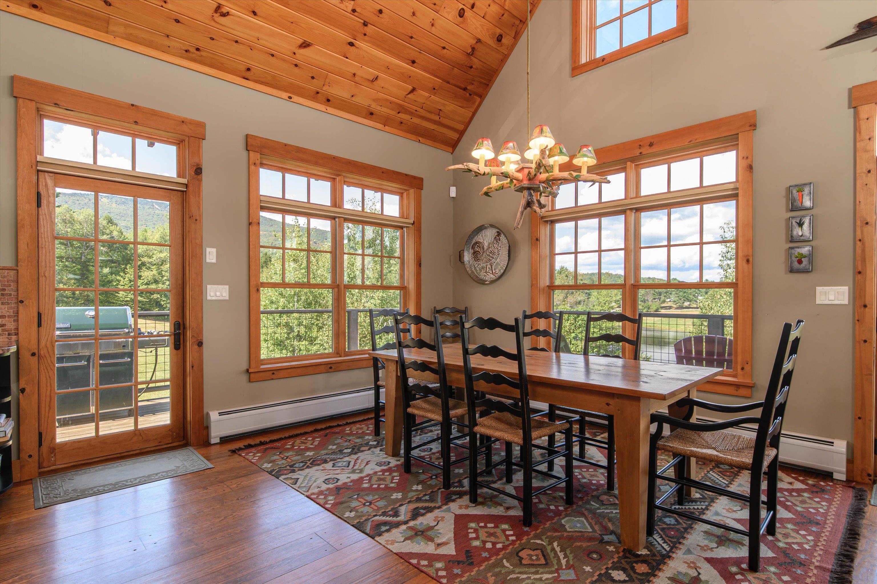 Dining Area with Walkout to Wrapped Deck