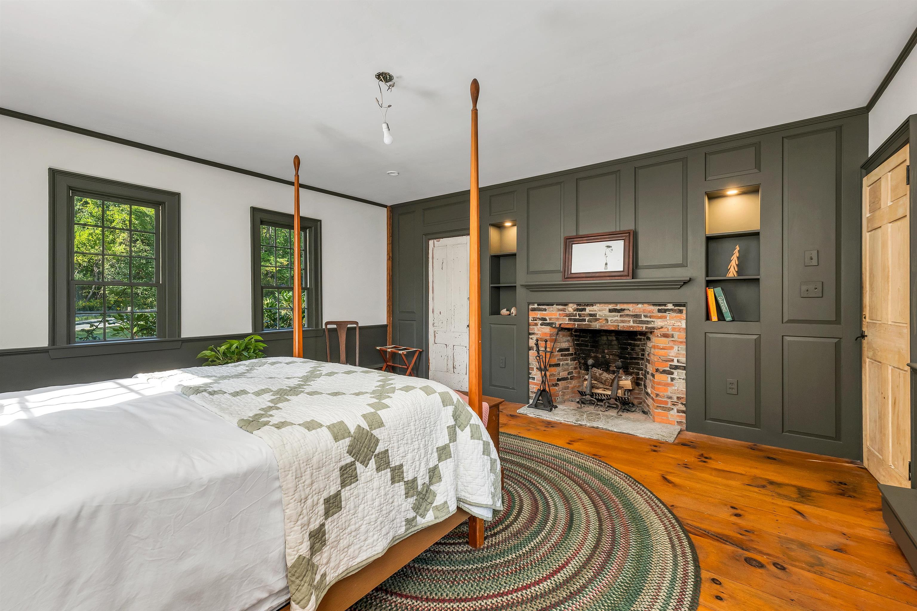 Main floor bedroom with working fireplace