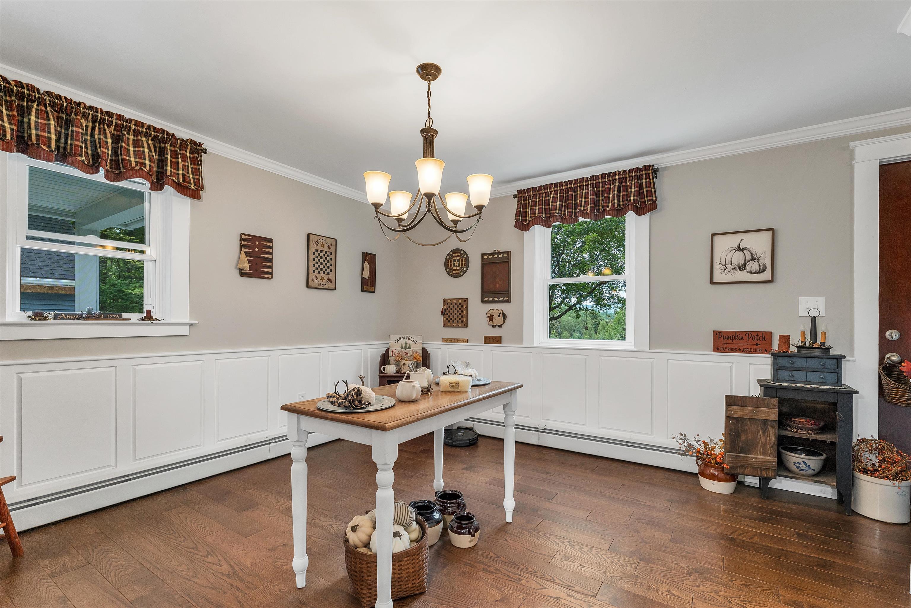 Dining room with hardwood flooring