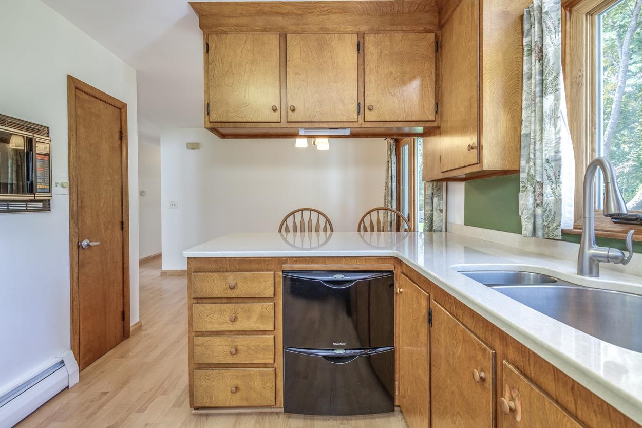 Kitchen with Solid Surface Countertops 24052396