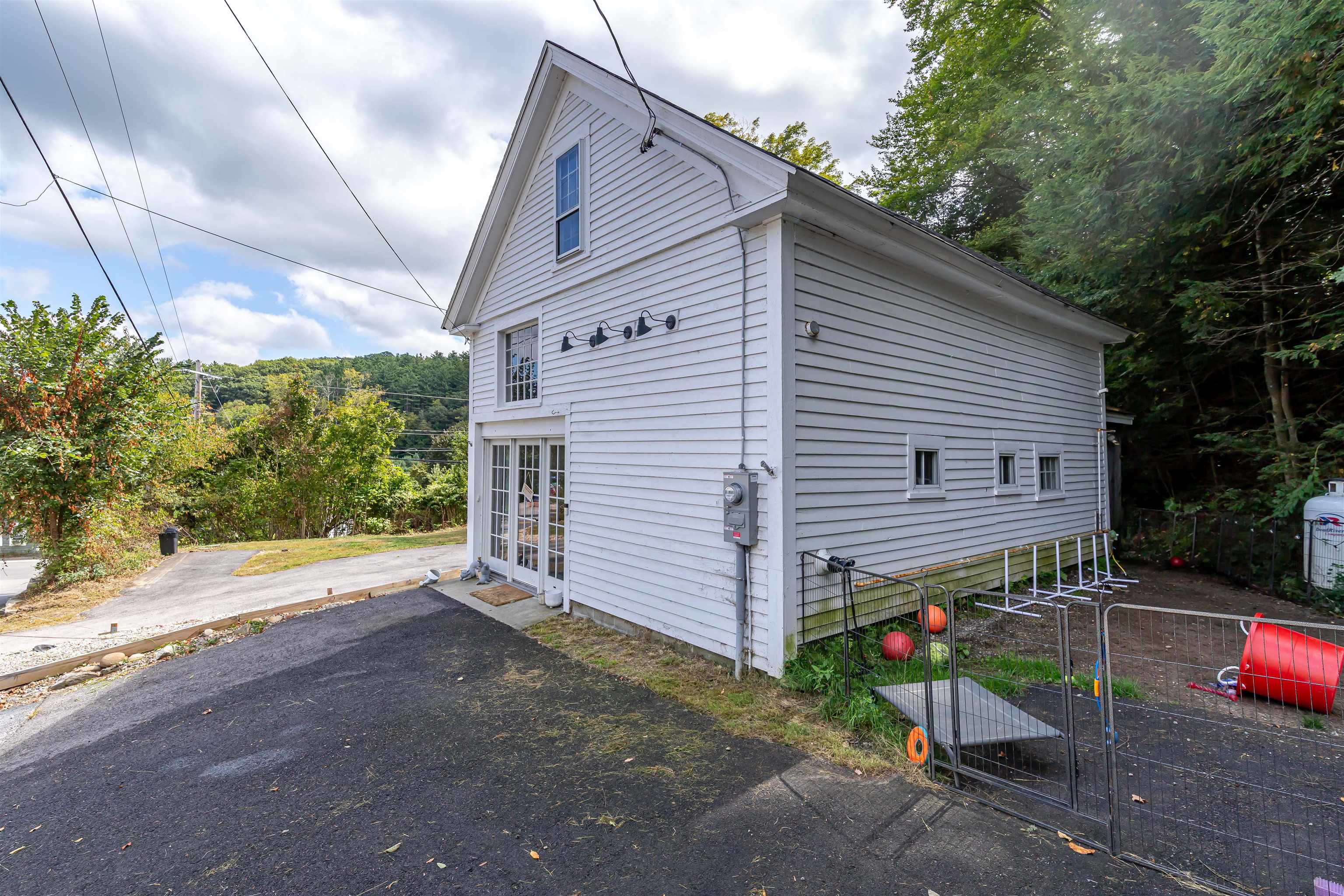 Good sized Paved parking area and side yard