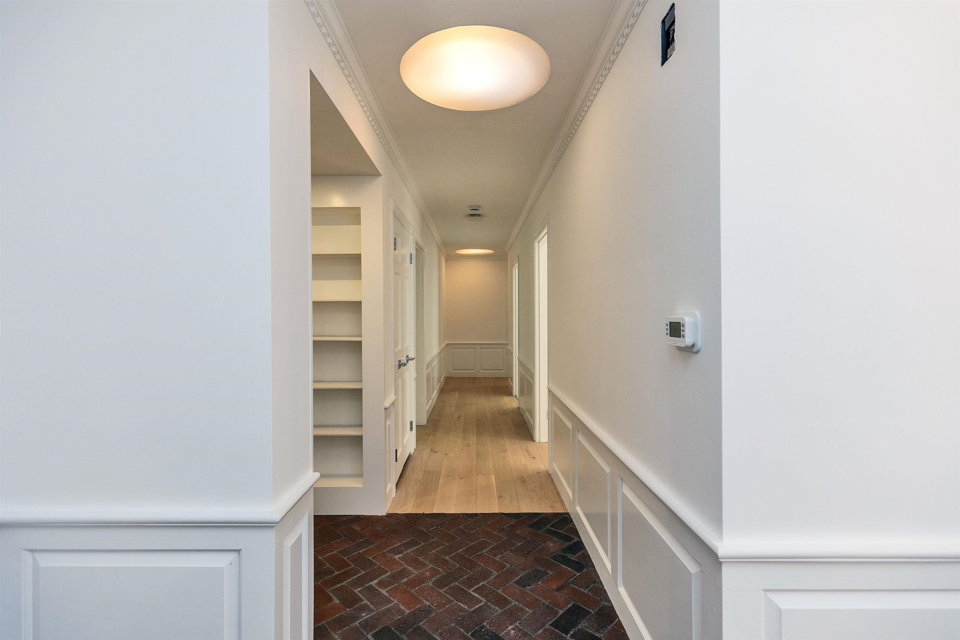 Hallway to Primary & 2 addnl Bedrooms 24060825