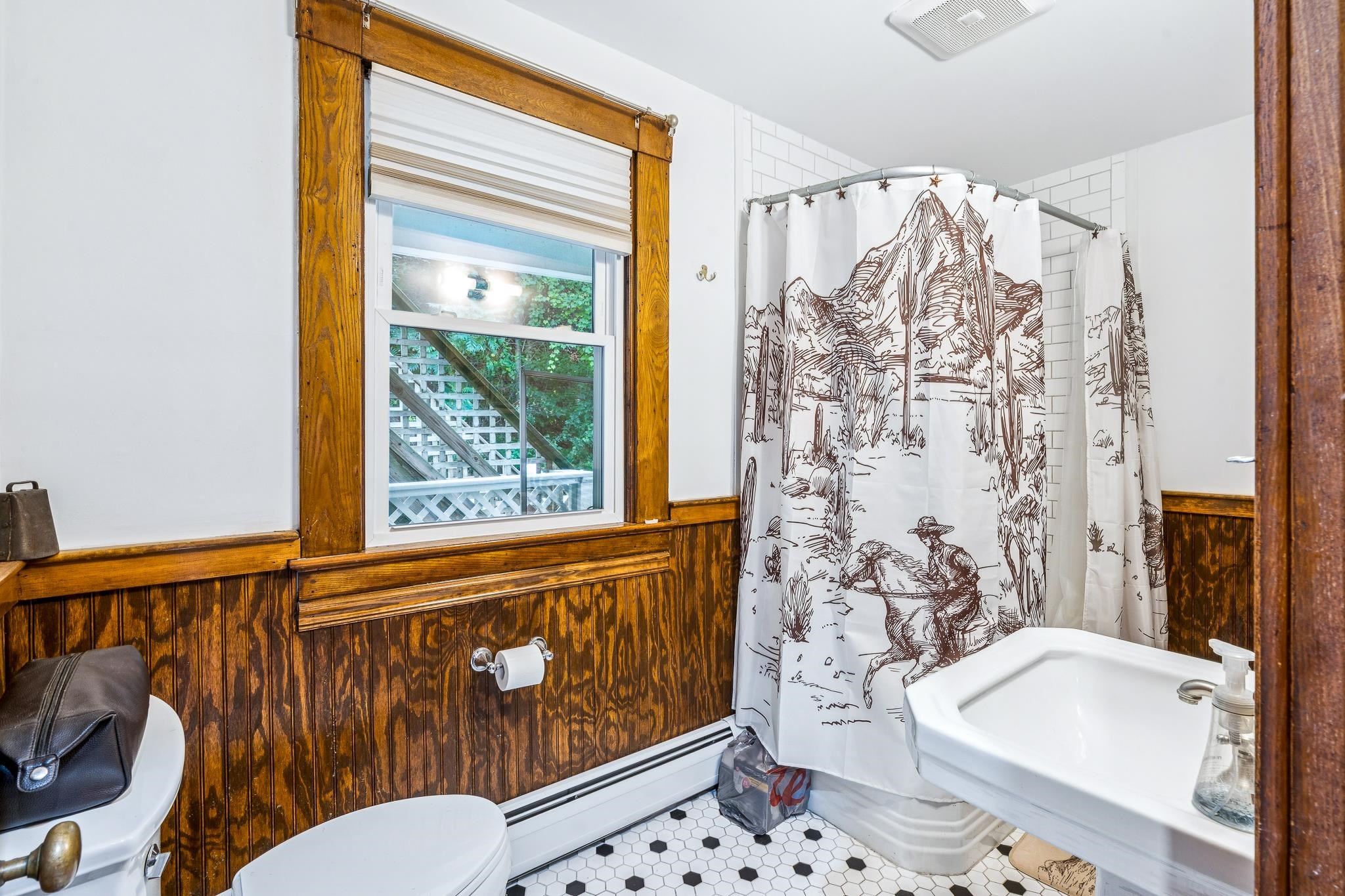 First Floor Bath Updated tile and restored woodwork