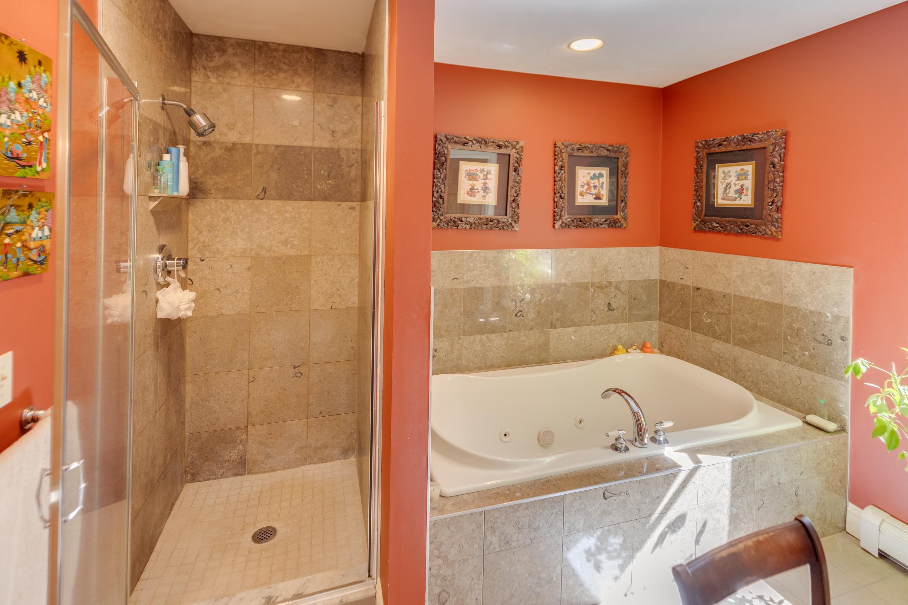 Tile/Glass walk-in shower with jetted tub