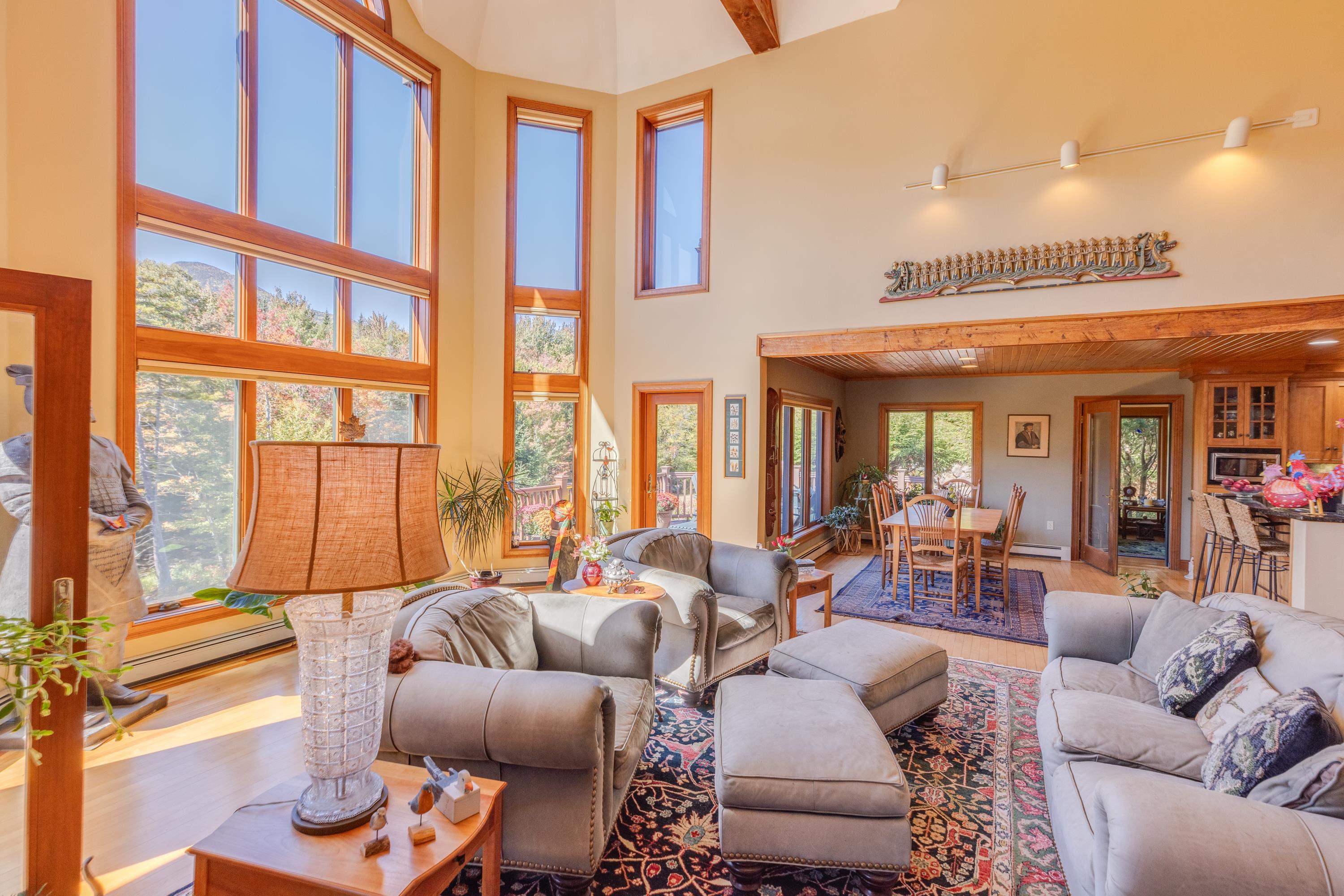 Dining area, kitchen and 4 season room is adjacent to the living room