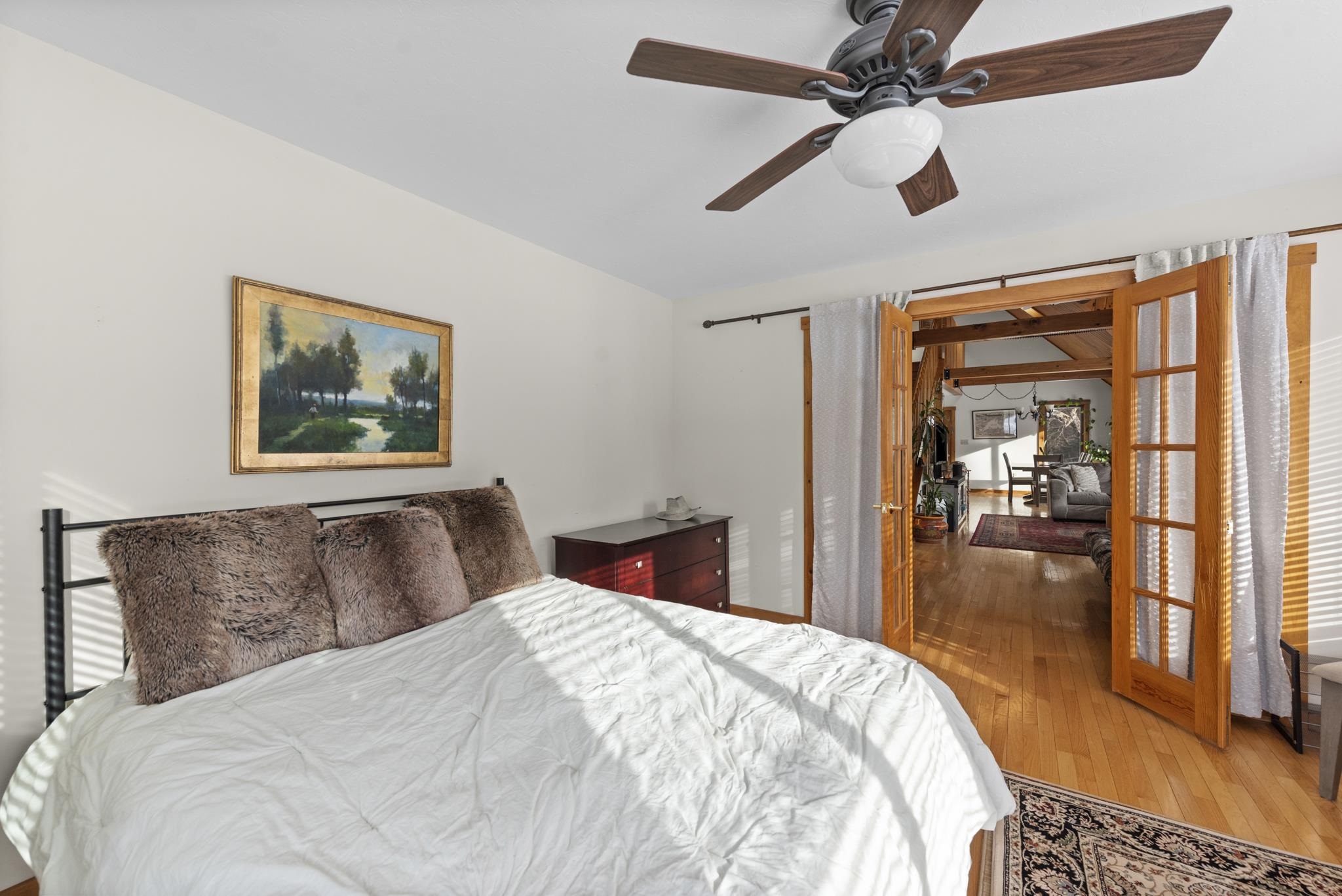 one of the two first floor bedrooms this one overlooks the expansive front yard