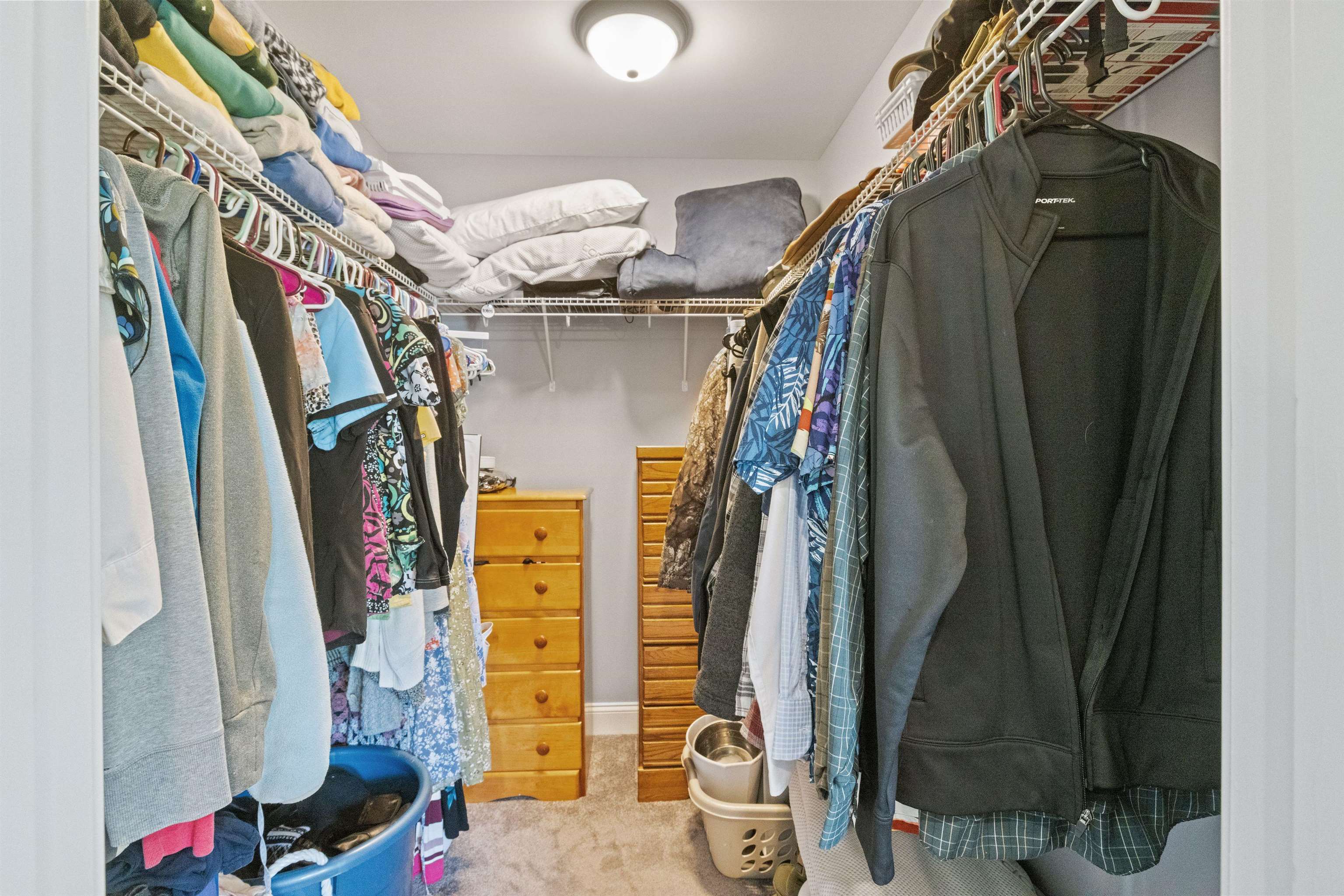 Walk in closet in primary suite