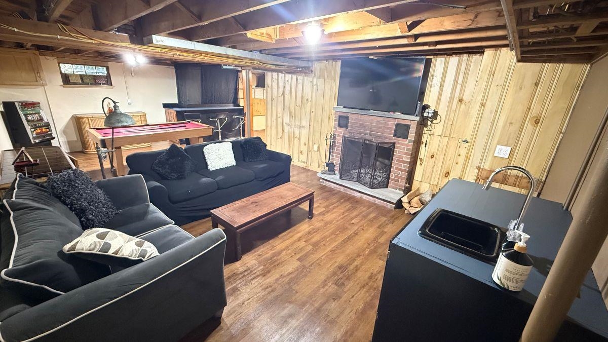 Basement living space with fireplace! 24166544