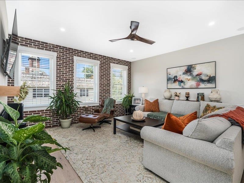 Living Room with Brick Wall 24101698