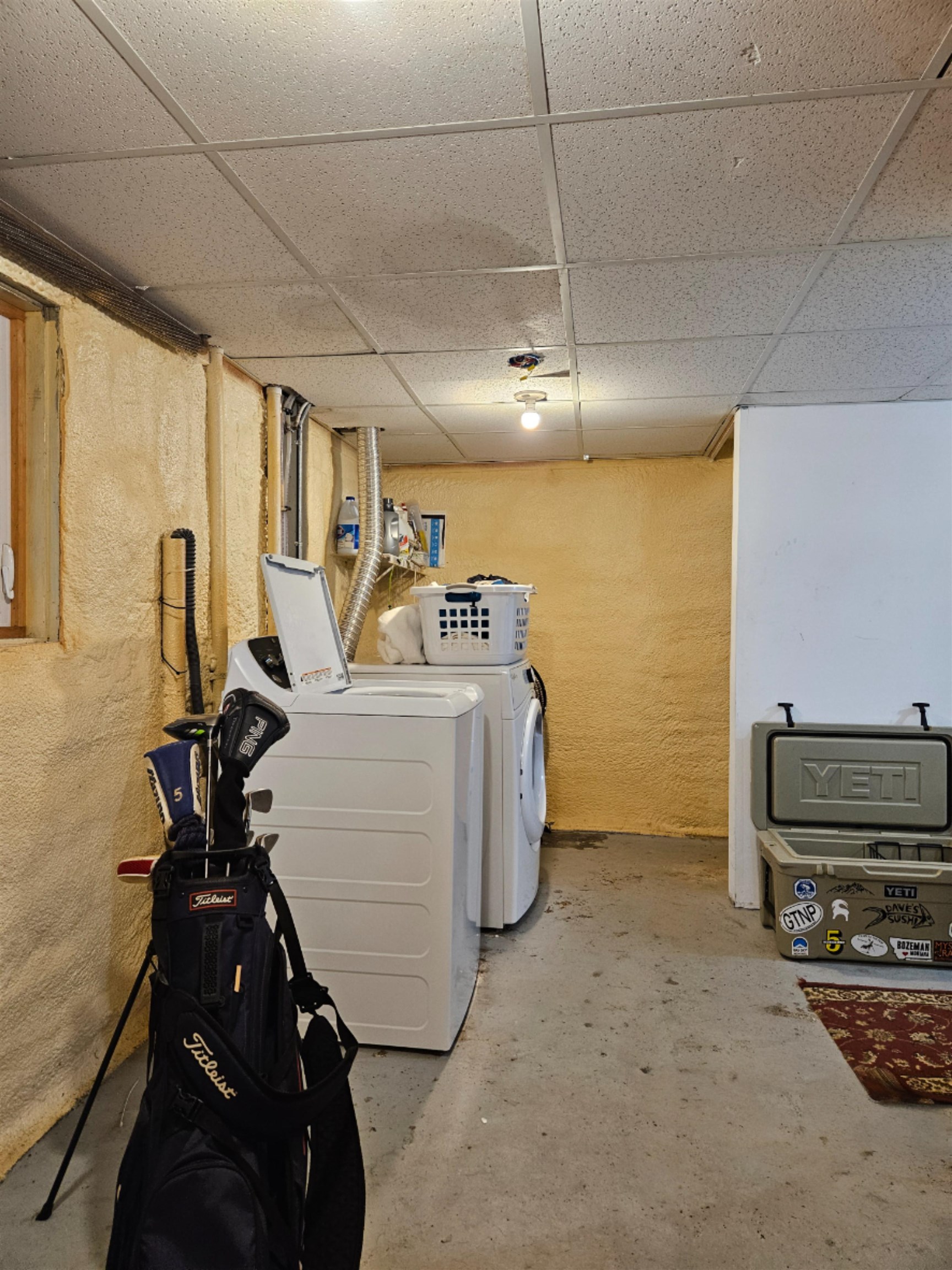 Laundry room in basement