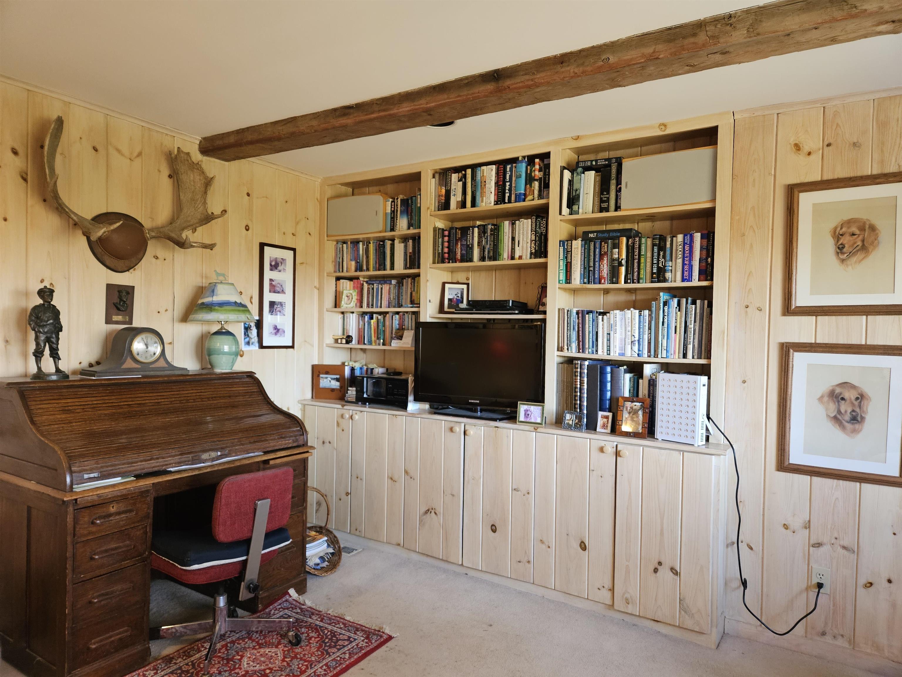 Library/family room off kitchen with lots of built-ins