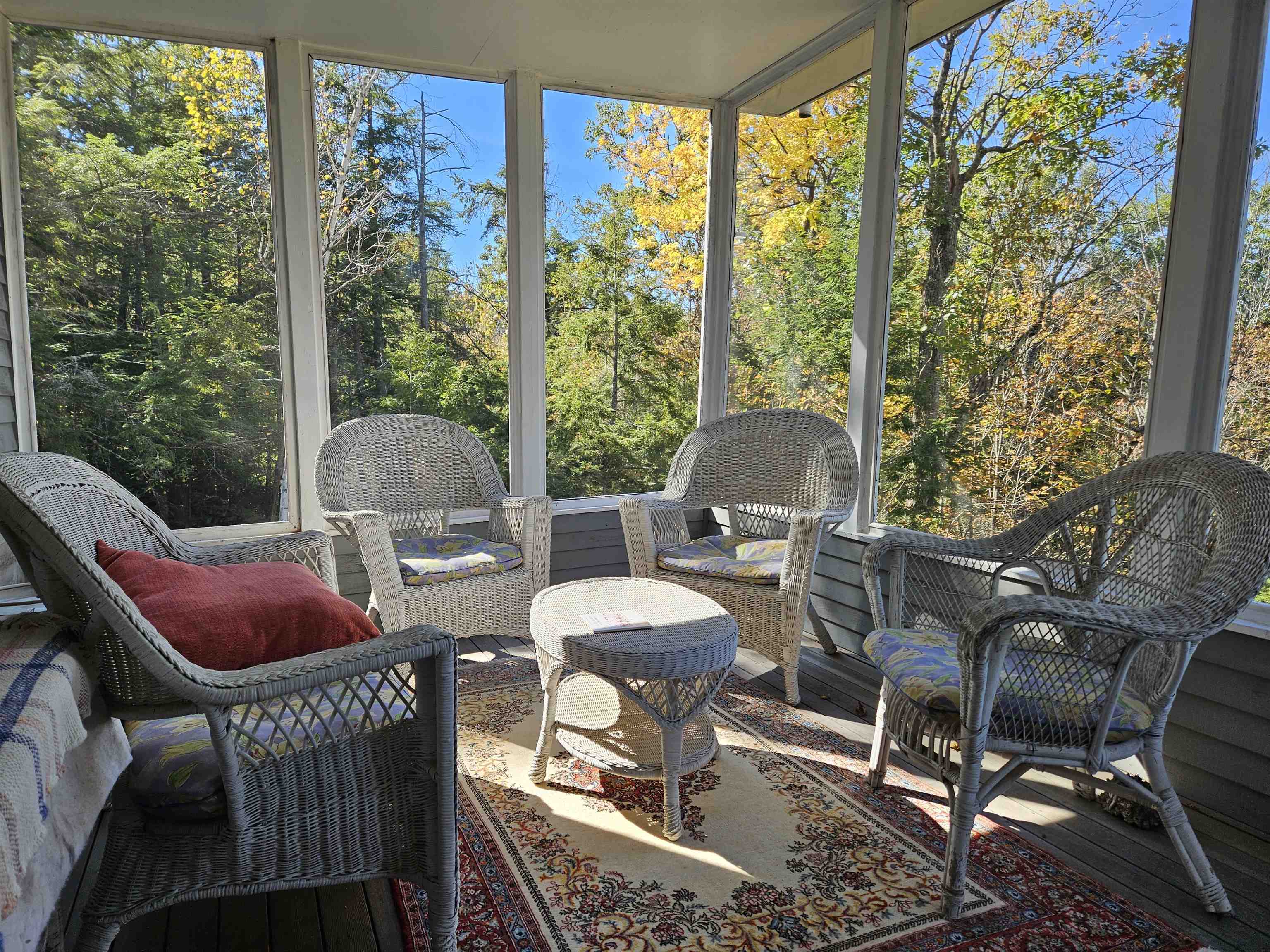 Screen porch off kitchen with fabulous views