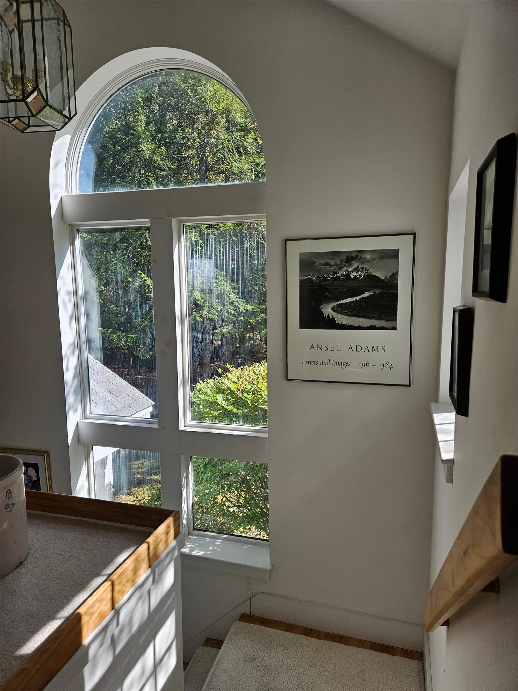 Elegant stairway with cathedral ceiling