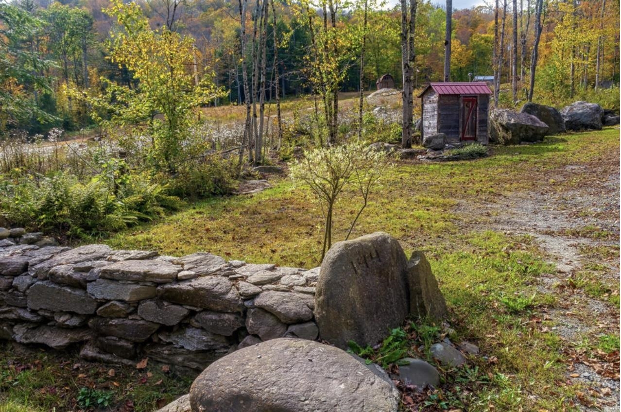 Stonewall at the Base of the Driveway 24182993