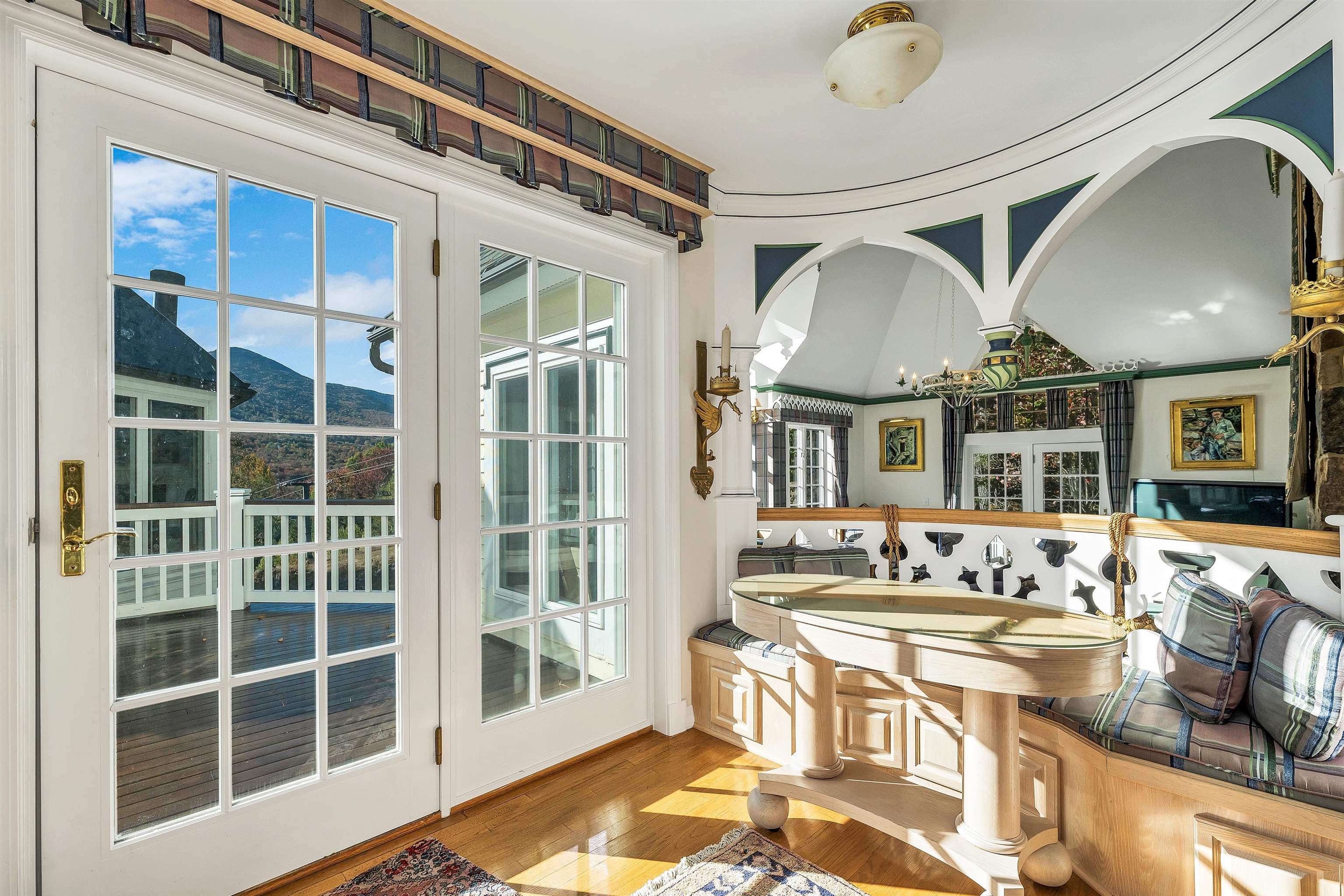 French Doors out from the Kitchen to Deck and Solarium