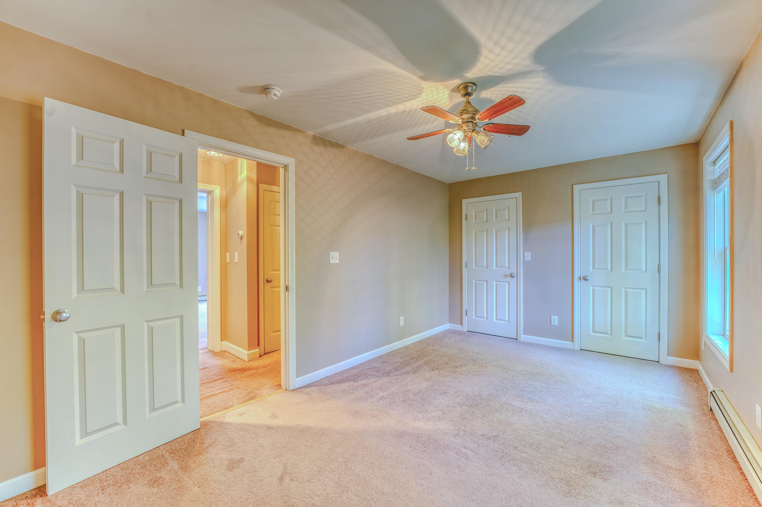 Second bedroom w/ two closets